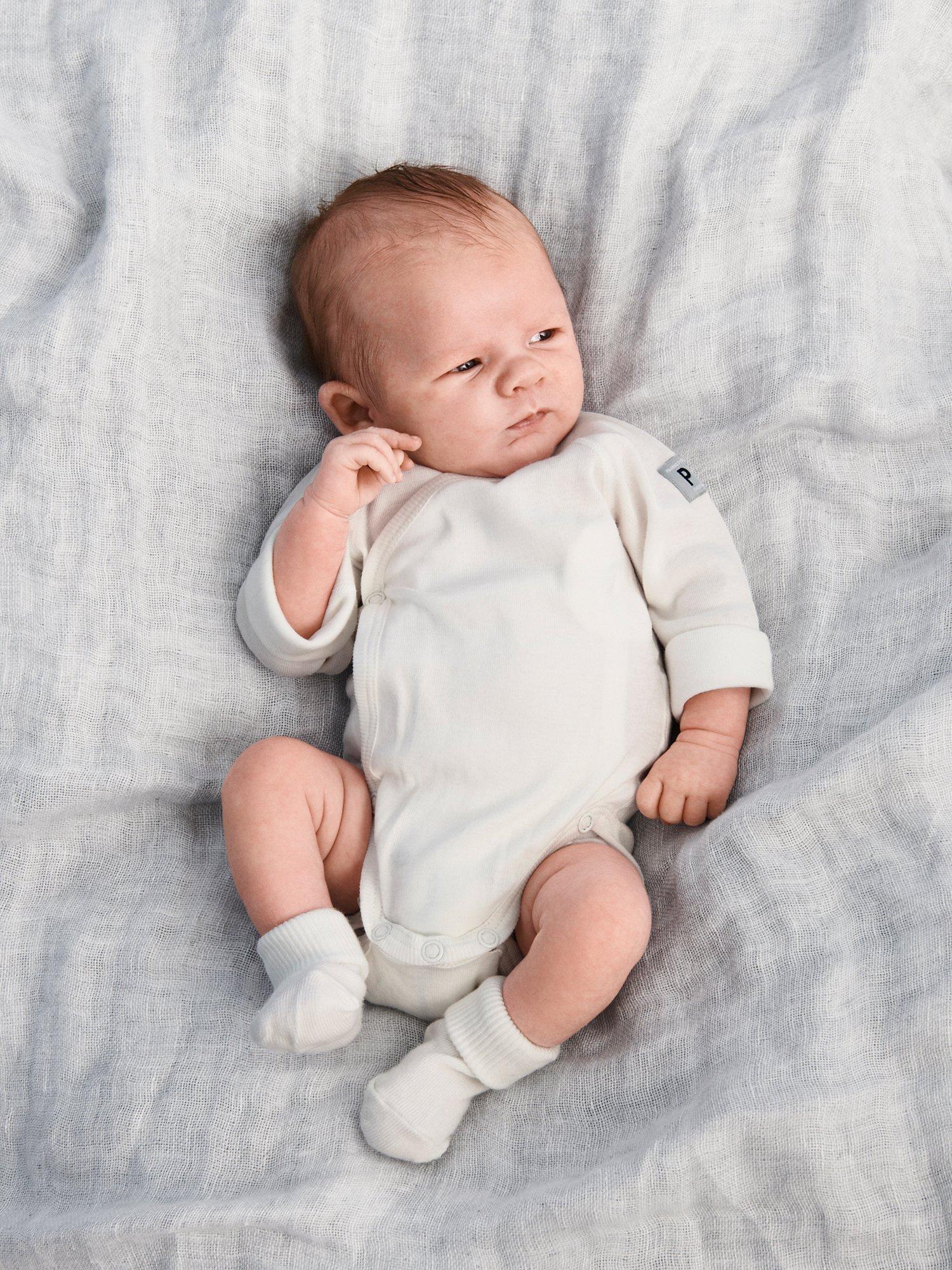 Product image 1 of 5, which shows Polarn O. Pyret Baby GOTS Organic Cotton Wraparound Bodysuit, White, Early baby