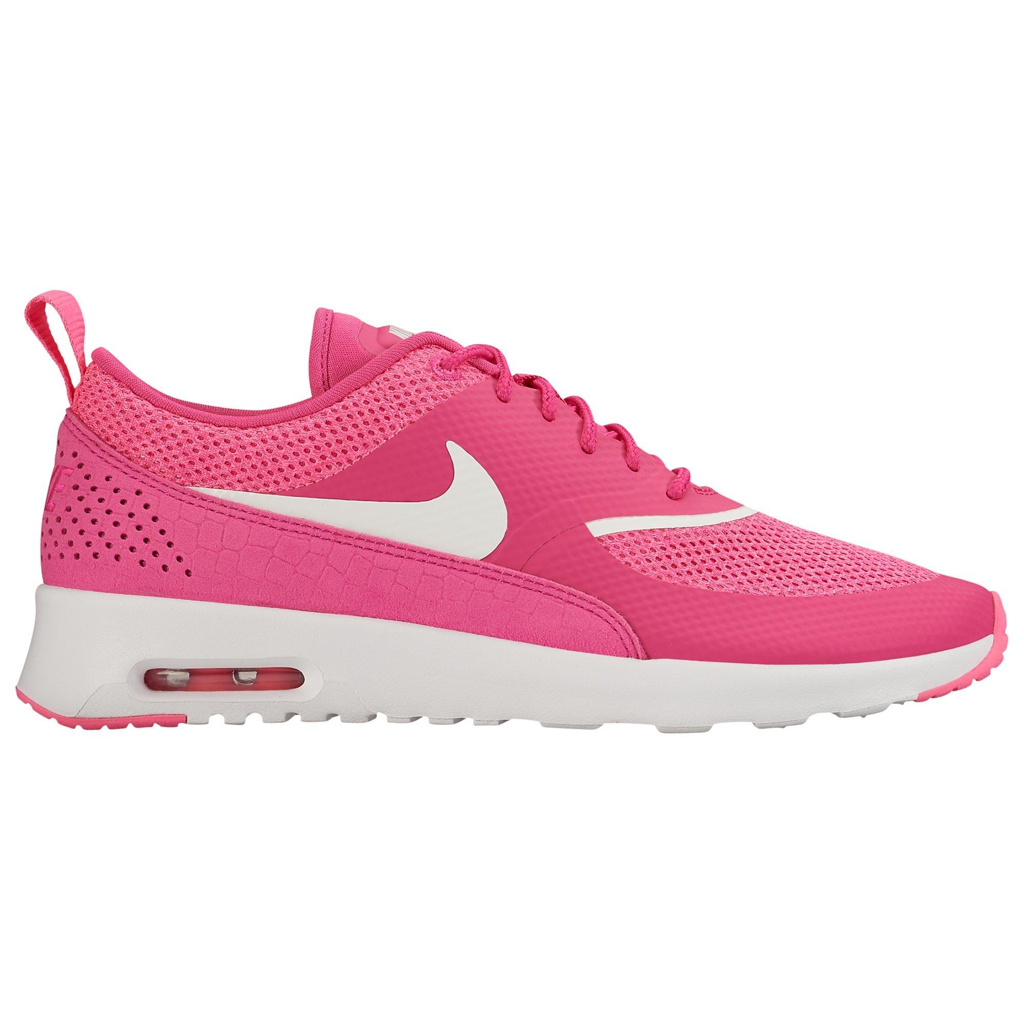 Nike thea pink and white hotsell