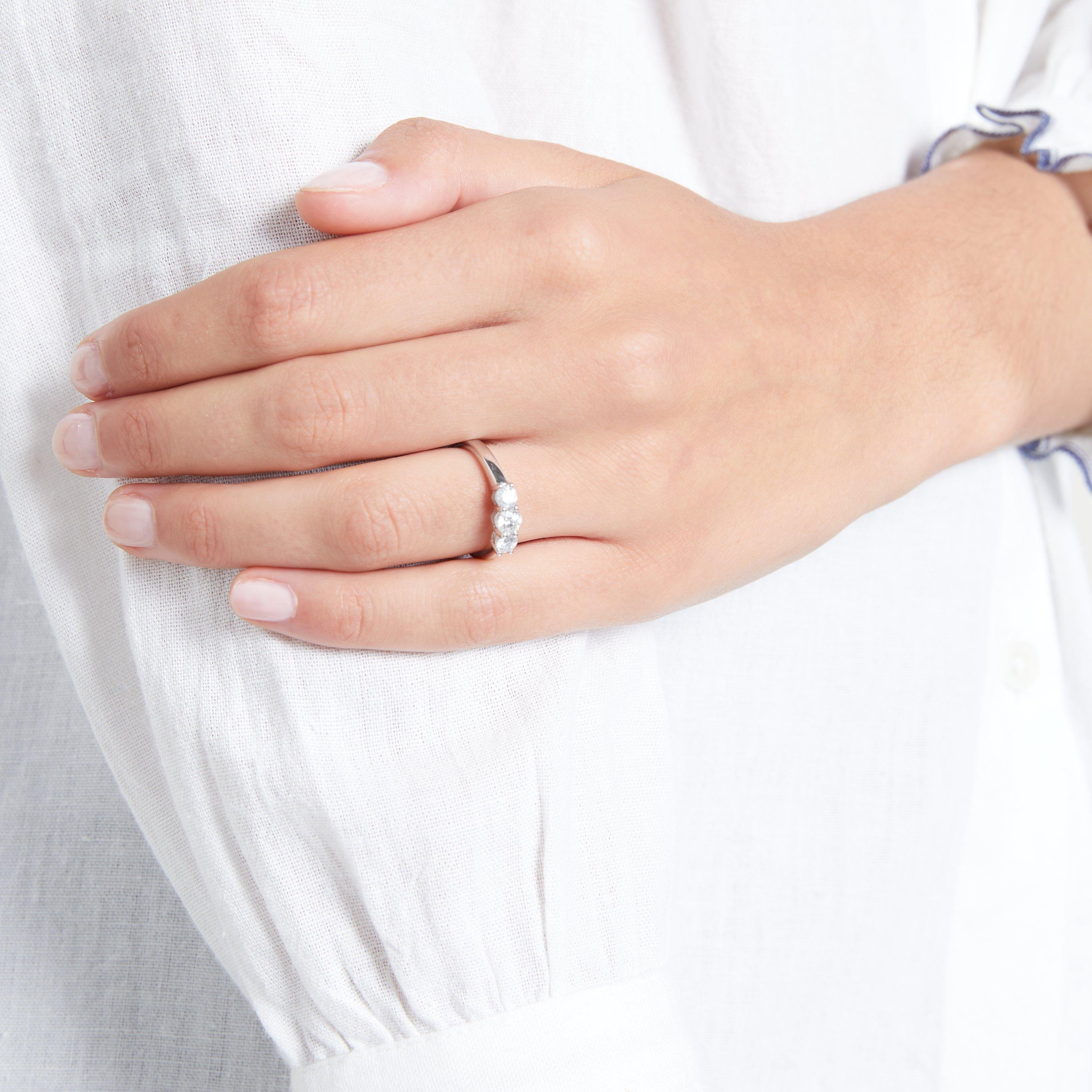 Product image 2 of 9, which shows Mogul 18ct White Gold Round Brilliant Diamond Trilogy Engagement Ring, 0.75ct, N