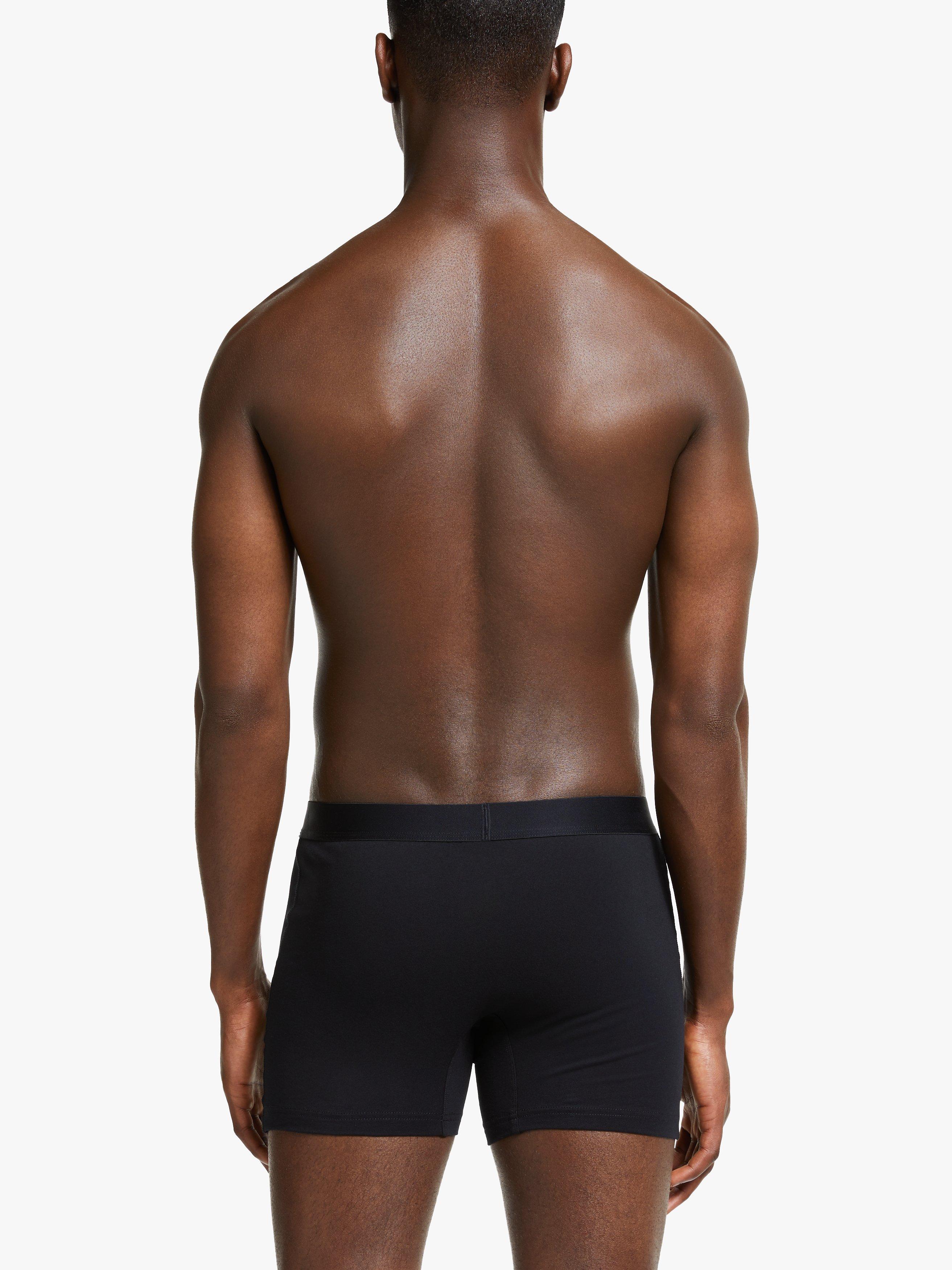 Product image 3 of 5, which shows John Lewis Organic Cotton Button Fly Trunks, Pack of 3, Black, S