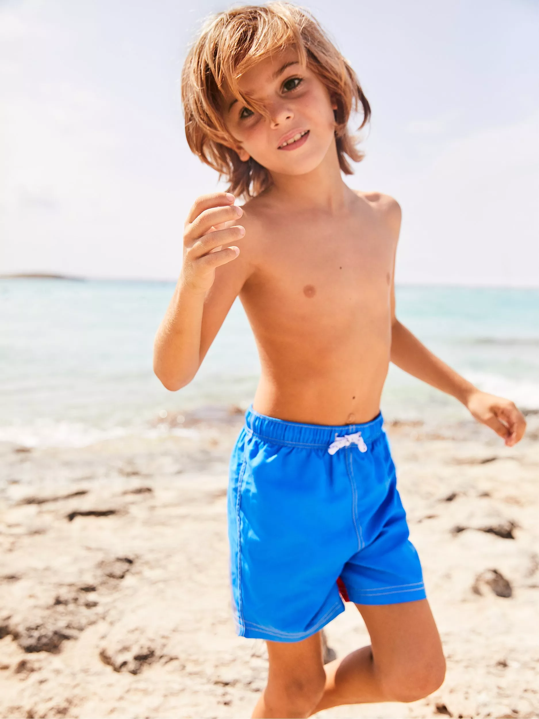 Mini boden swim trunks online