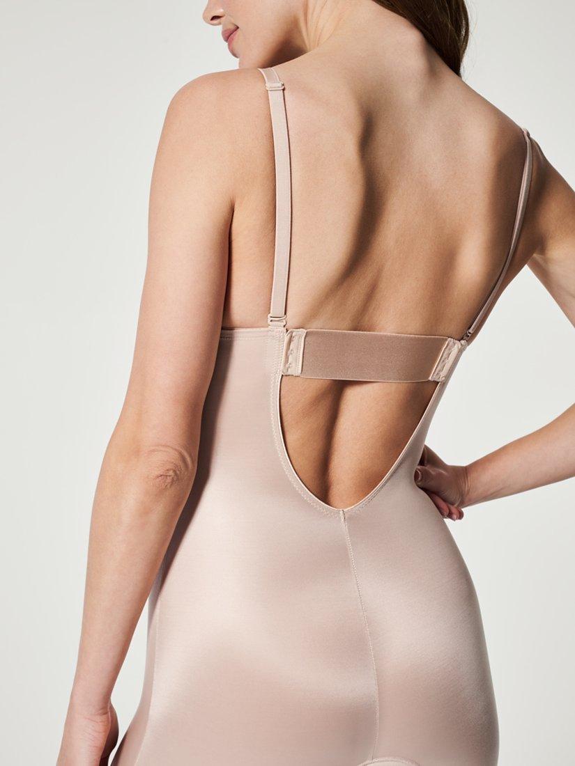 Product image 10 of 11, which shows Spanx SPANXshape™ Suit Your Fancy Plunge Low-Back Mid-Thigh Bodysuit, Nude, S