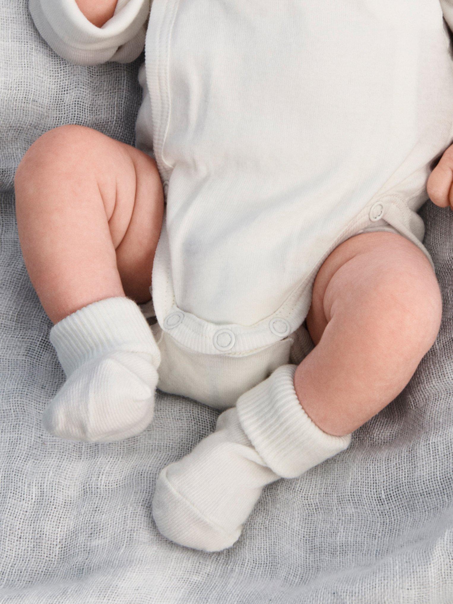 Product image 4 of 5, which shows Polarn O. Pyret Baby GOTS Organic Cotton Frill Collar Bodysuit, White, 0-1 month