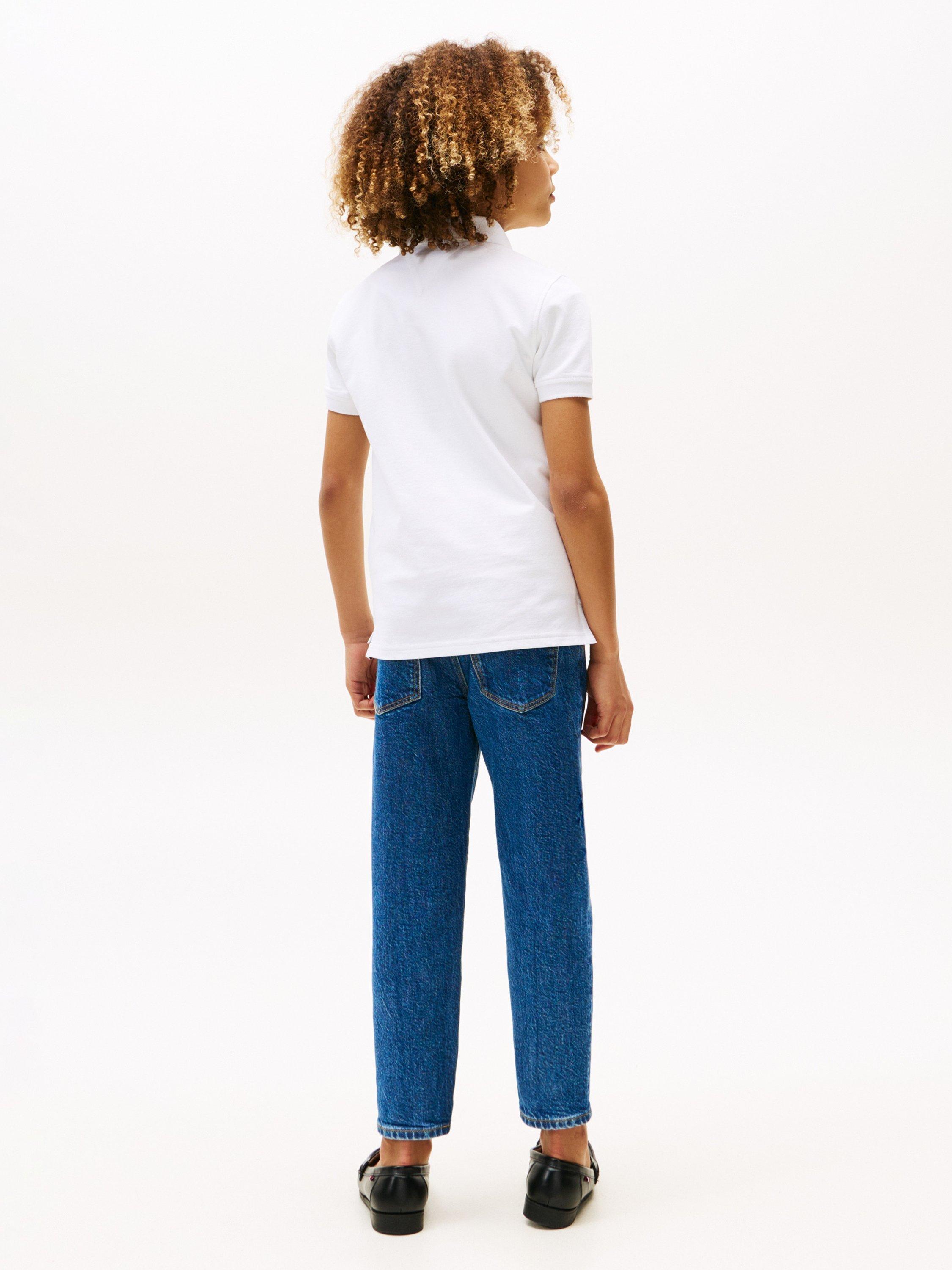 Product image 2 of 6, which shows Tommy Hilfiger Kids' Organic Cotton Short Sleeve Polo Shirt, Bright White, 3 years