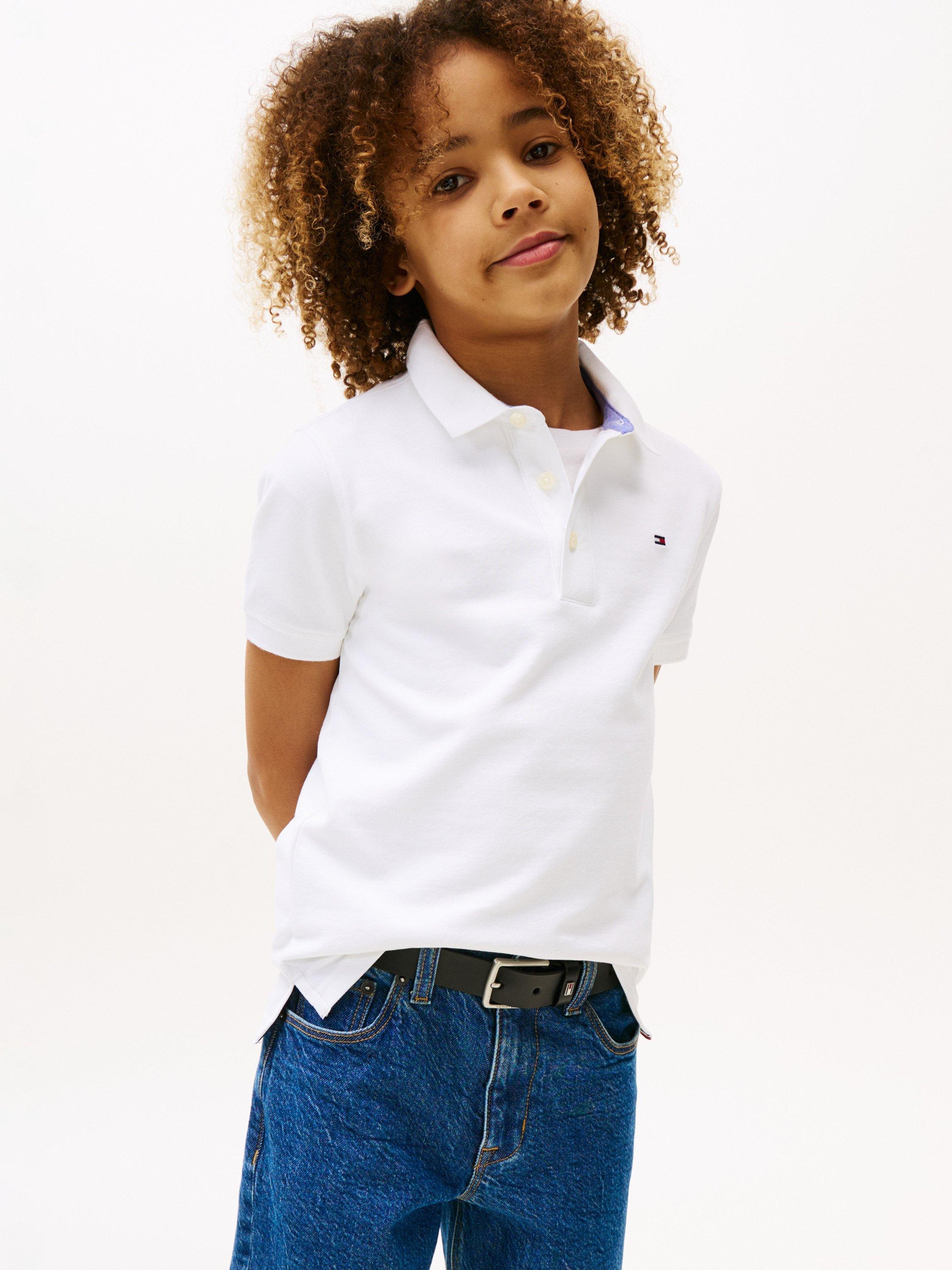 Product image 5 of 6, which shows Tommy Hilfiger Kids' Organic Cotton Short Sleeve Polo Shirt, Bright White, 3 years