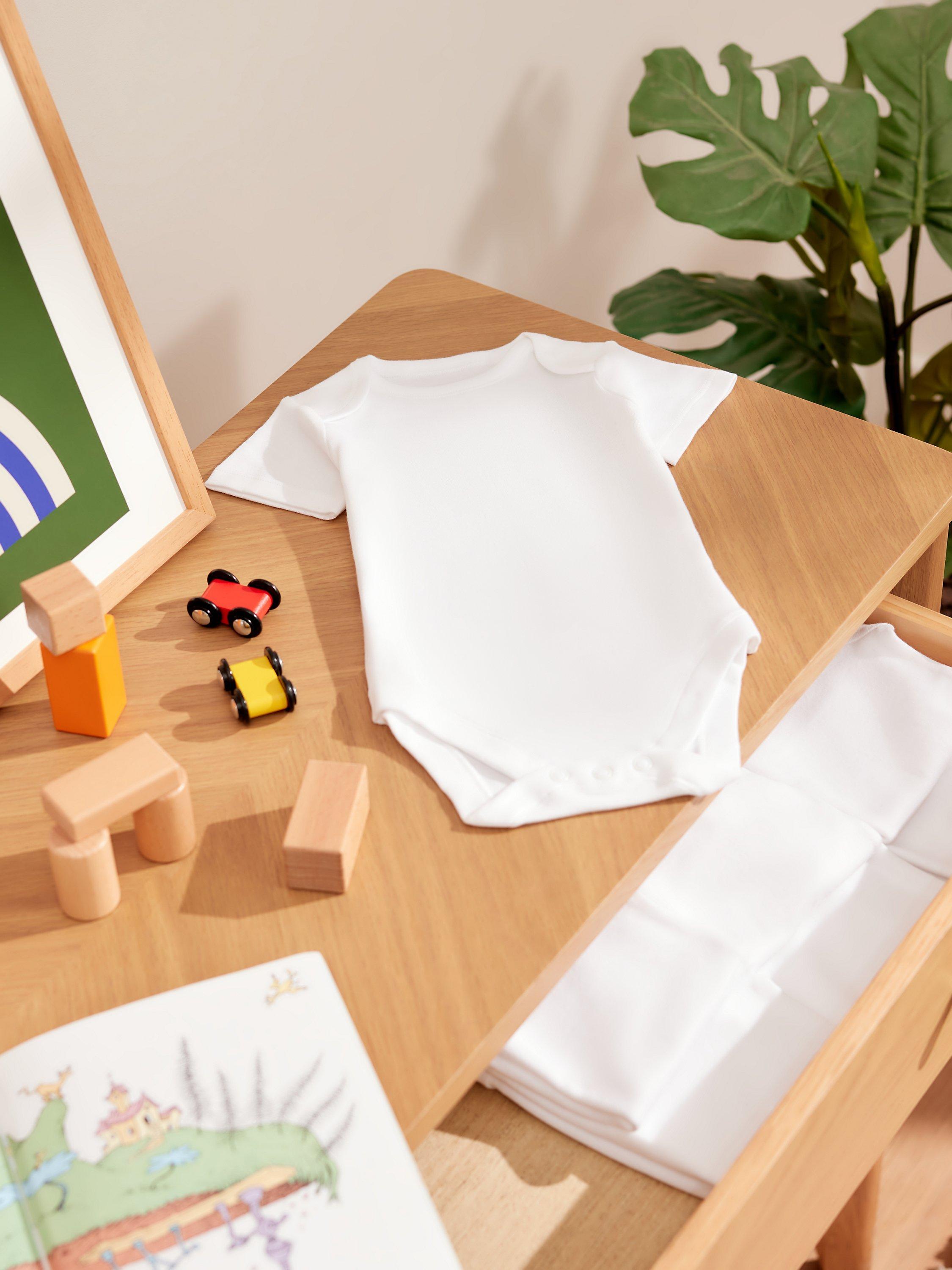 Product image 1 of 3, which shows John Lewis Baby Cotton Short Sleeve Bodysuit, Pack of 7, White, Early Baby