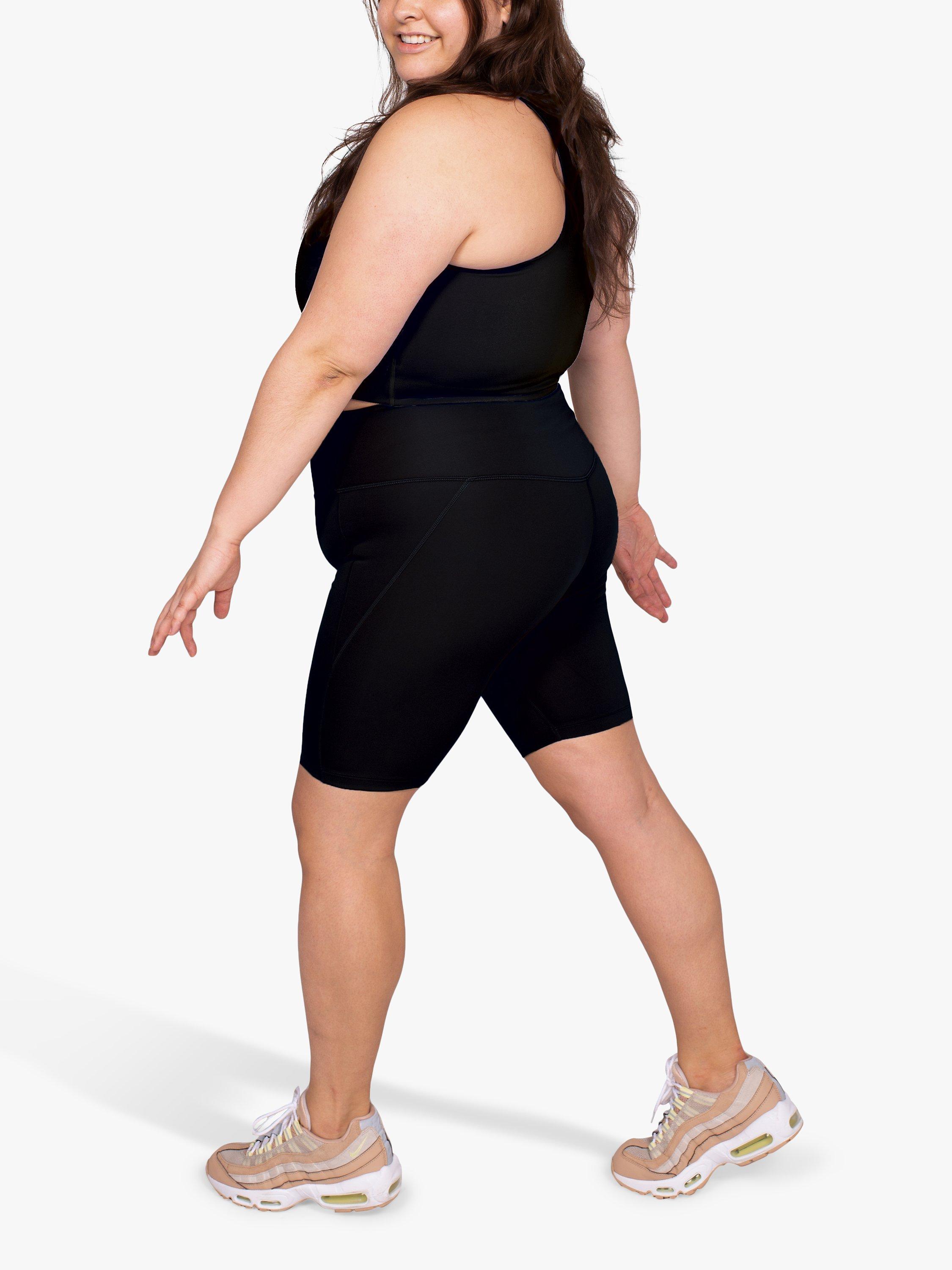 Product image 7 of 10, which shows Girlfriend Collective High Rise Bike Shorts, Black, XXS