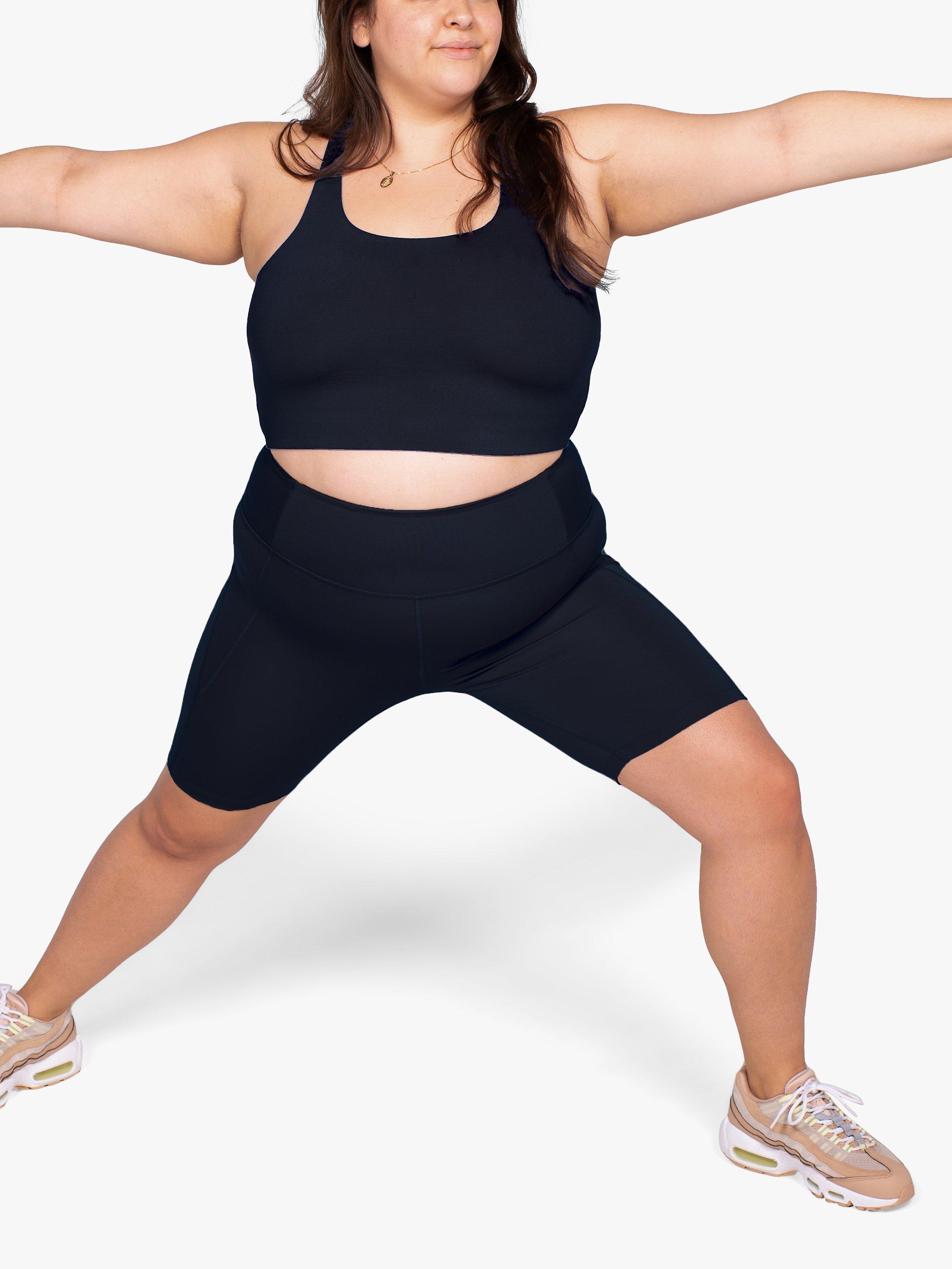 Product image 8 of 10, which shows Girlfriend Collective High Rise Bike Shorts, Black, XXS