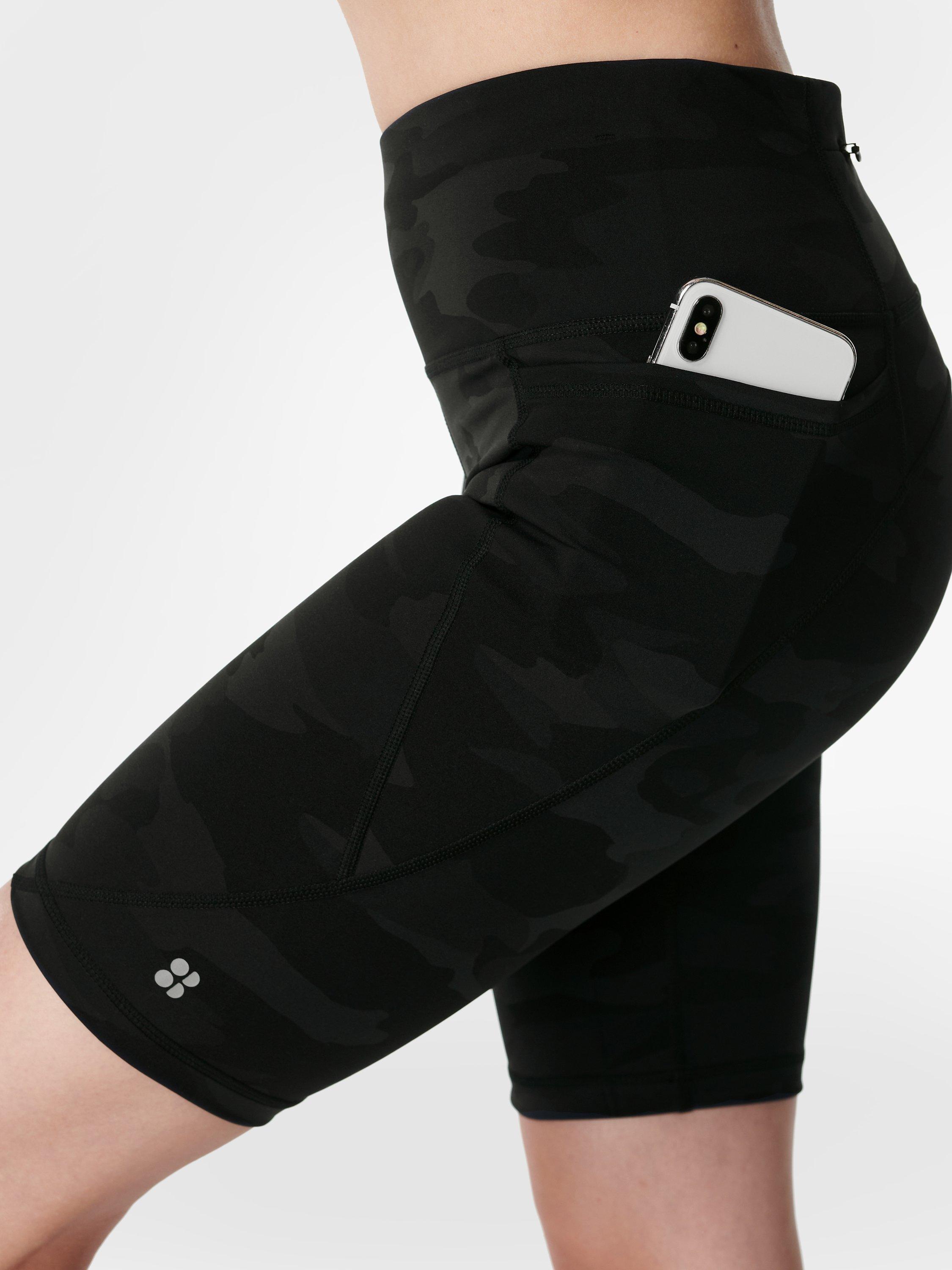 Product image 9 of 11, which shows Sweaty Betty Power 9" Biker Shorts, Black Camo, XXS