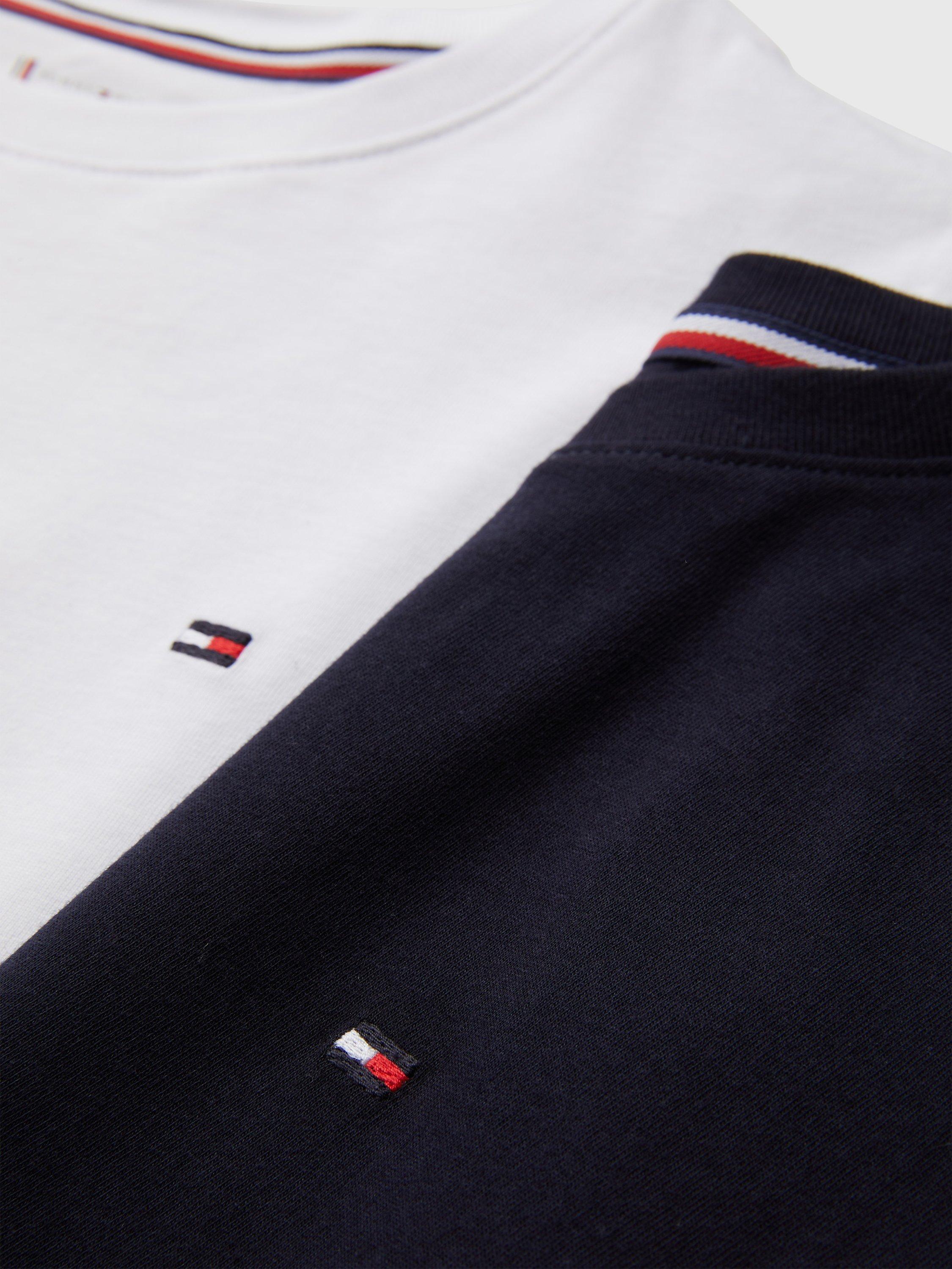 Product image 3 of 5, which shows Tommy Hilfiger Kids' Plain Logo T-Shirts, Pack of 2, Desert Sky/White, 8-10 years