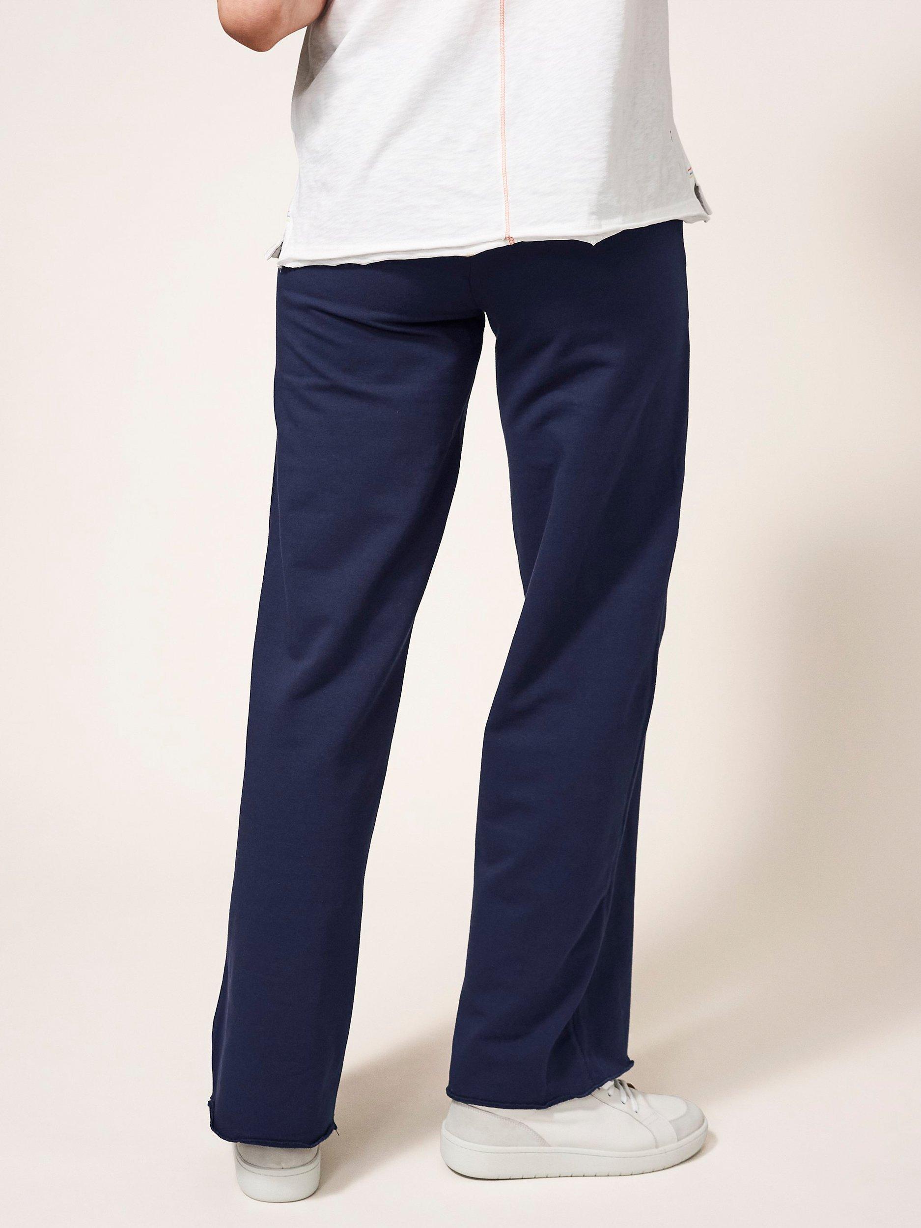 Product image 2 of 7, which shows White Stuff Dolce Organic Cotton Wide Leg Joggers, Navy, 6R