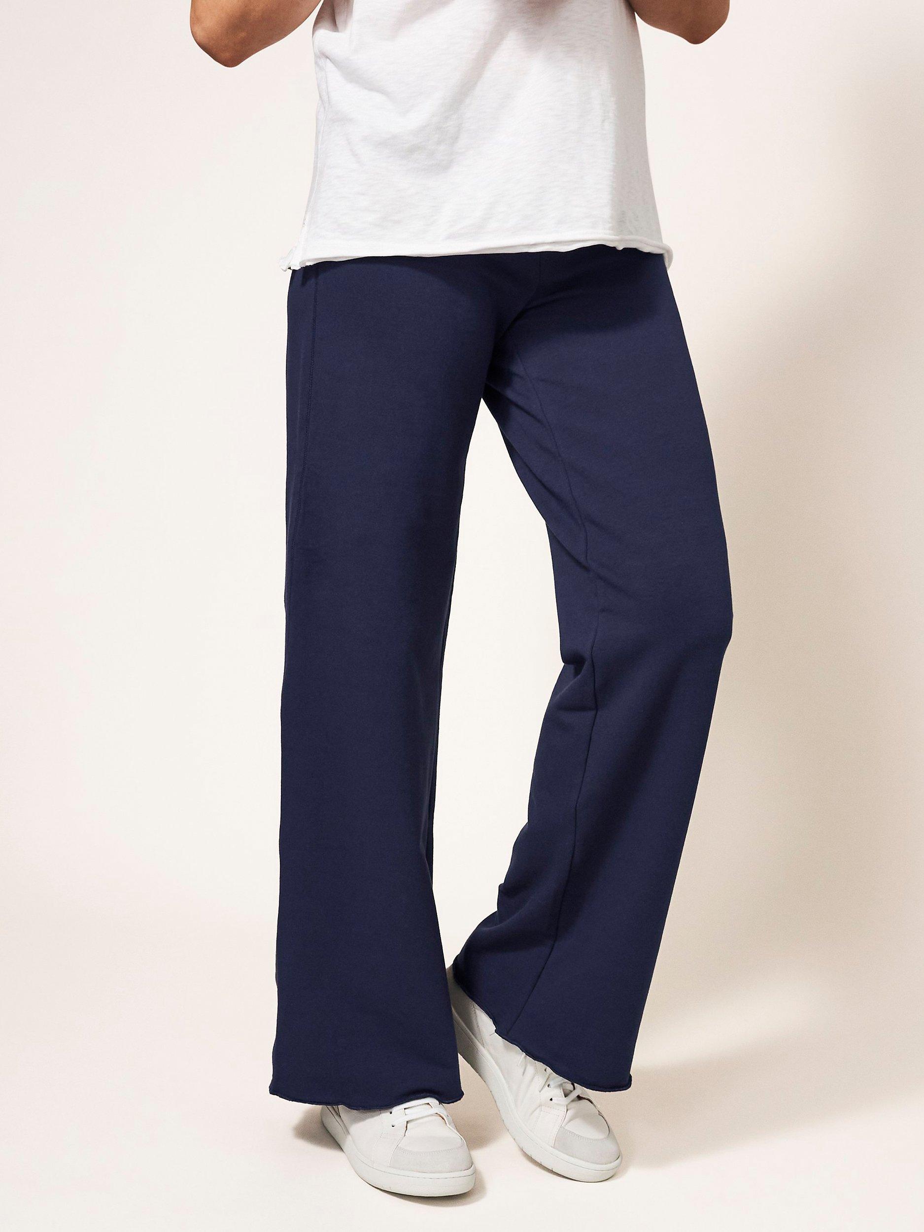Product image 4 of 7, which shows White Stuff Dolce Organic Cotton Wide Leg Joggers, Navy, 6R