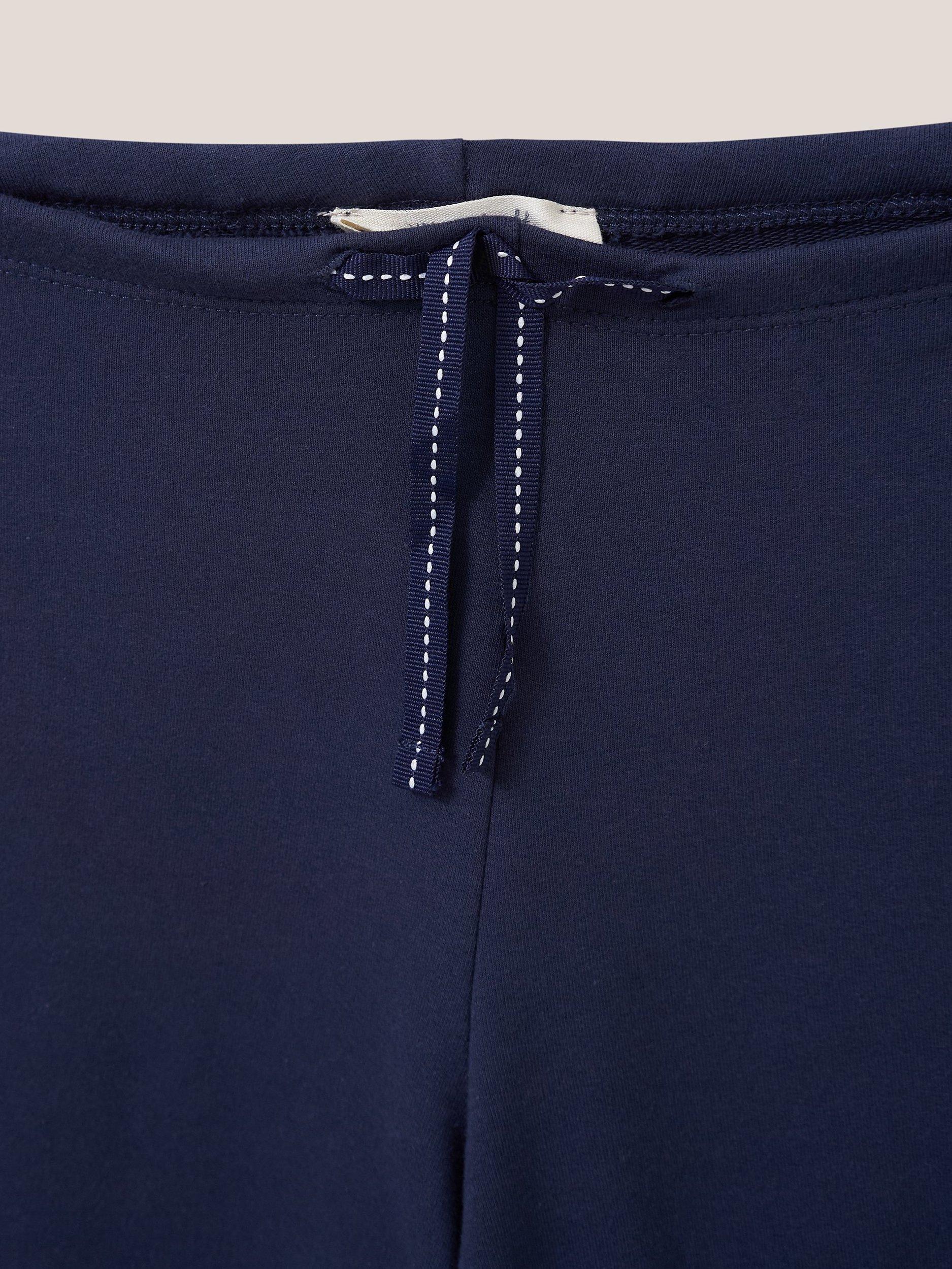 Product image 6 of 7, which shows White Stuff Dolce Organic Cotton Wide Leg Joggers, Navy, 6R