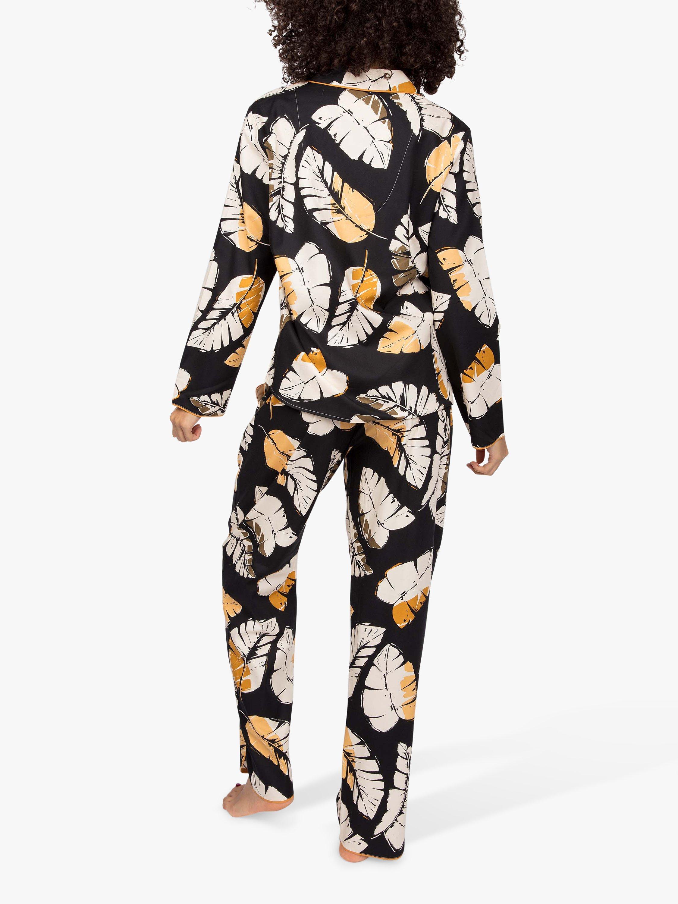 Product image 2 of 5, which shows Cyberjammies Annie Leaf Print Pyjama Set, Black Mix, 8