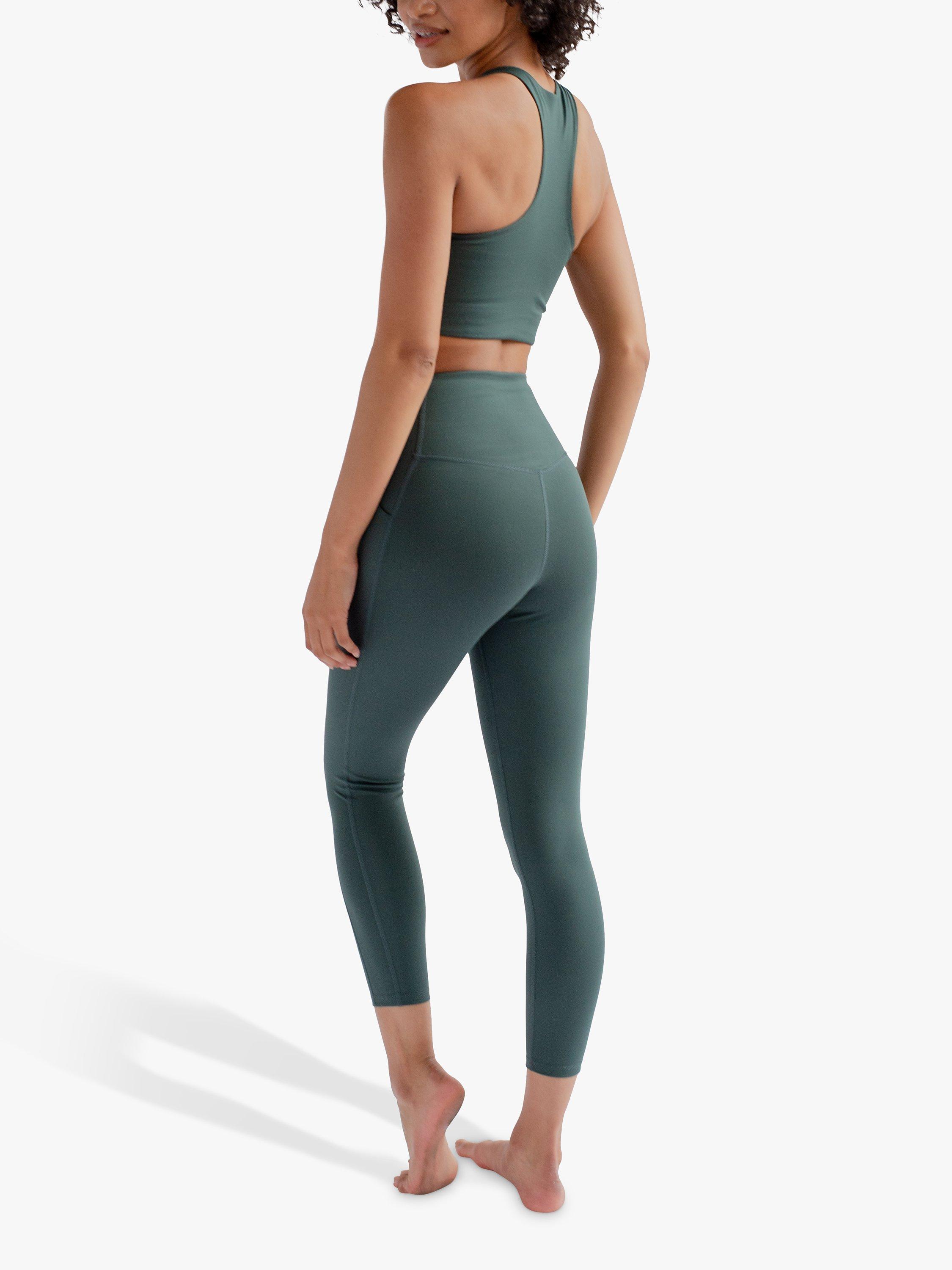 Product image 4 of 4, which shows Girlfriend Collective Compressive High Rise 7/8 Leggings, Moss Green, XXS