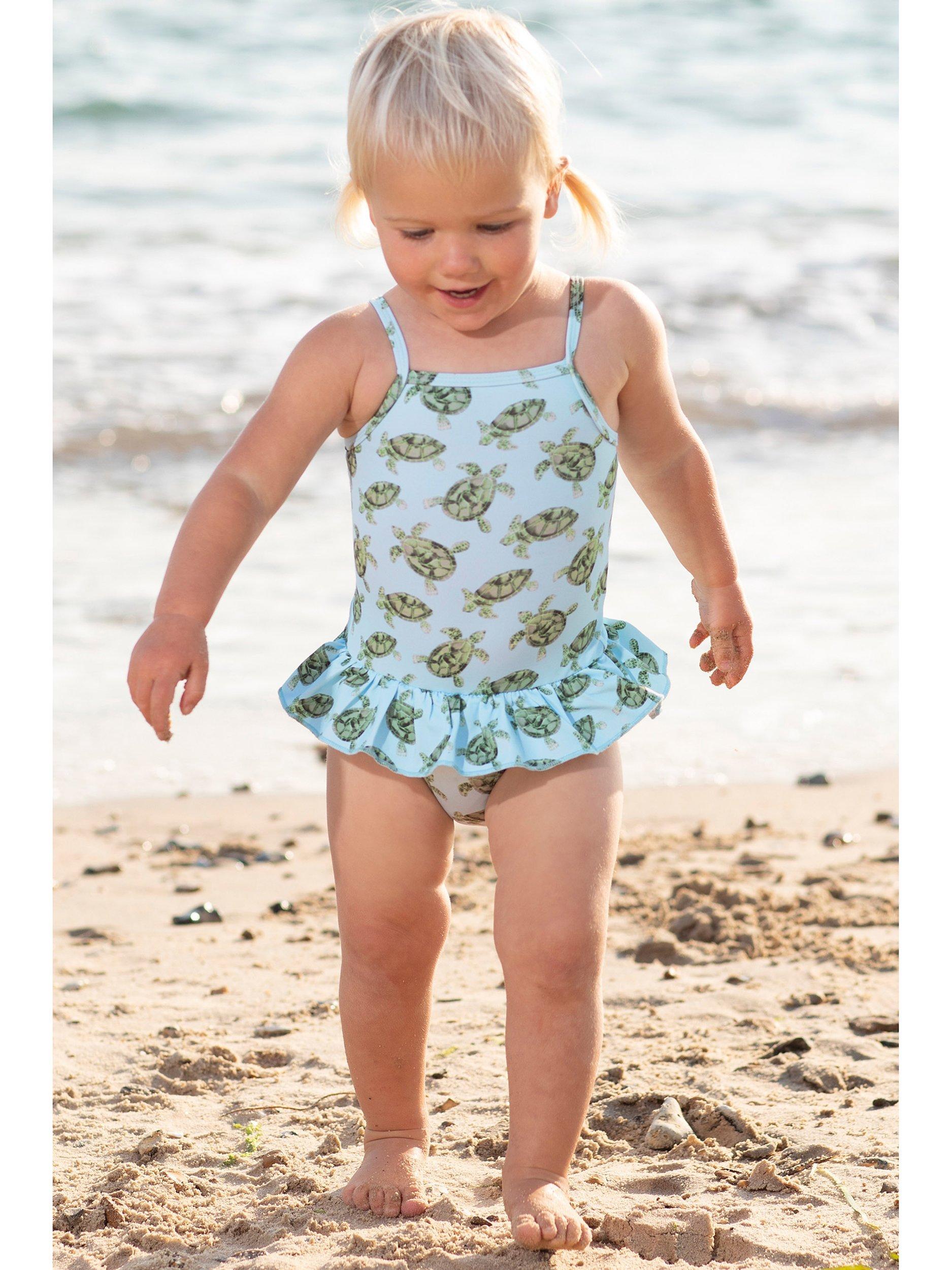 Product image 6 of 6, which shows Trotters Baby Turtle Peplum Swimsuit, Blue, 3-6 months
