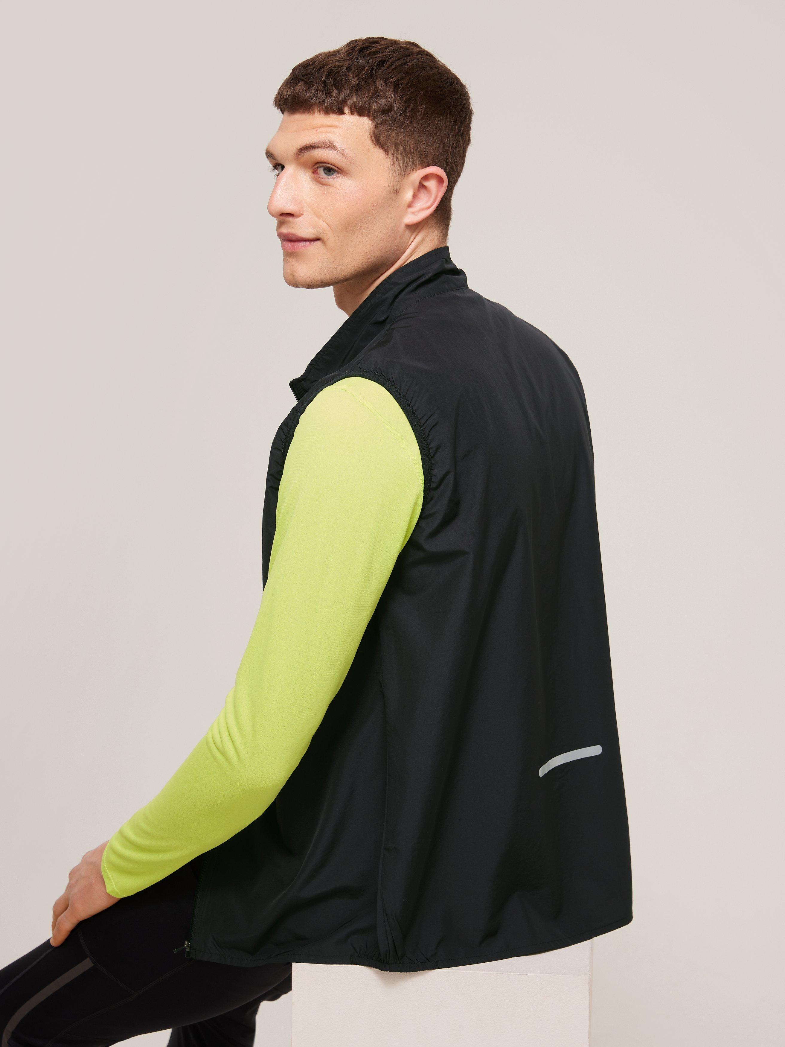 Product image 2 of 6, which shows Ronhill Core Men's Water Resistant Running Gilet, Black/Bright White, S