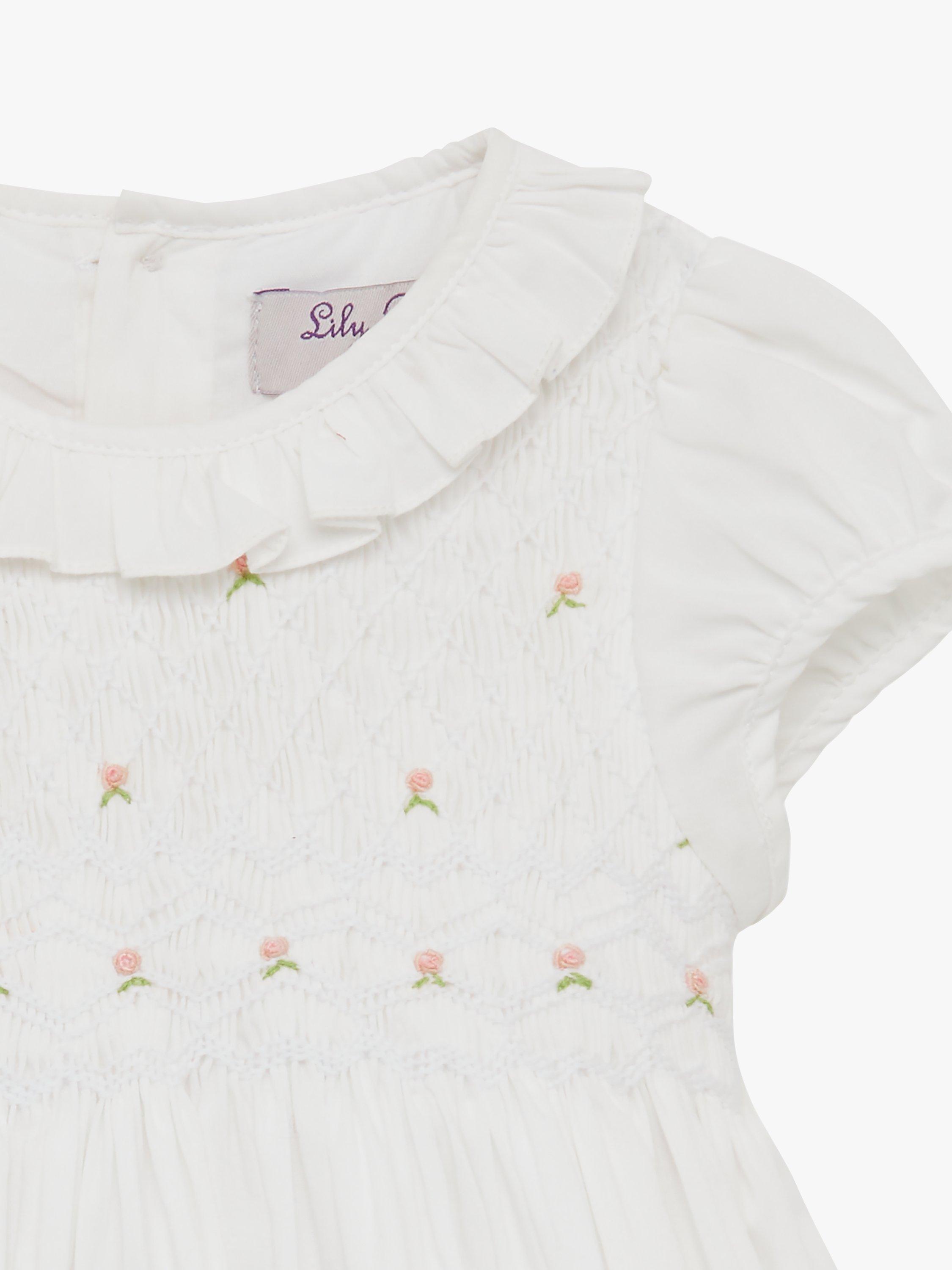 Product image 4 of 4, which shows Trotters Willow Kids Rose Hand-Smocked Dress, White, 12-18 months