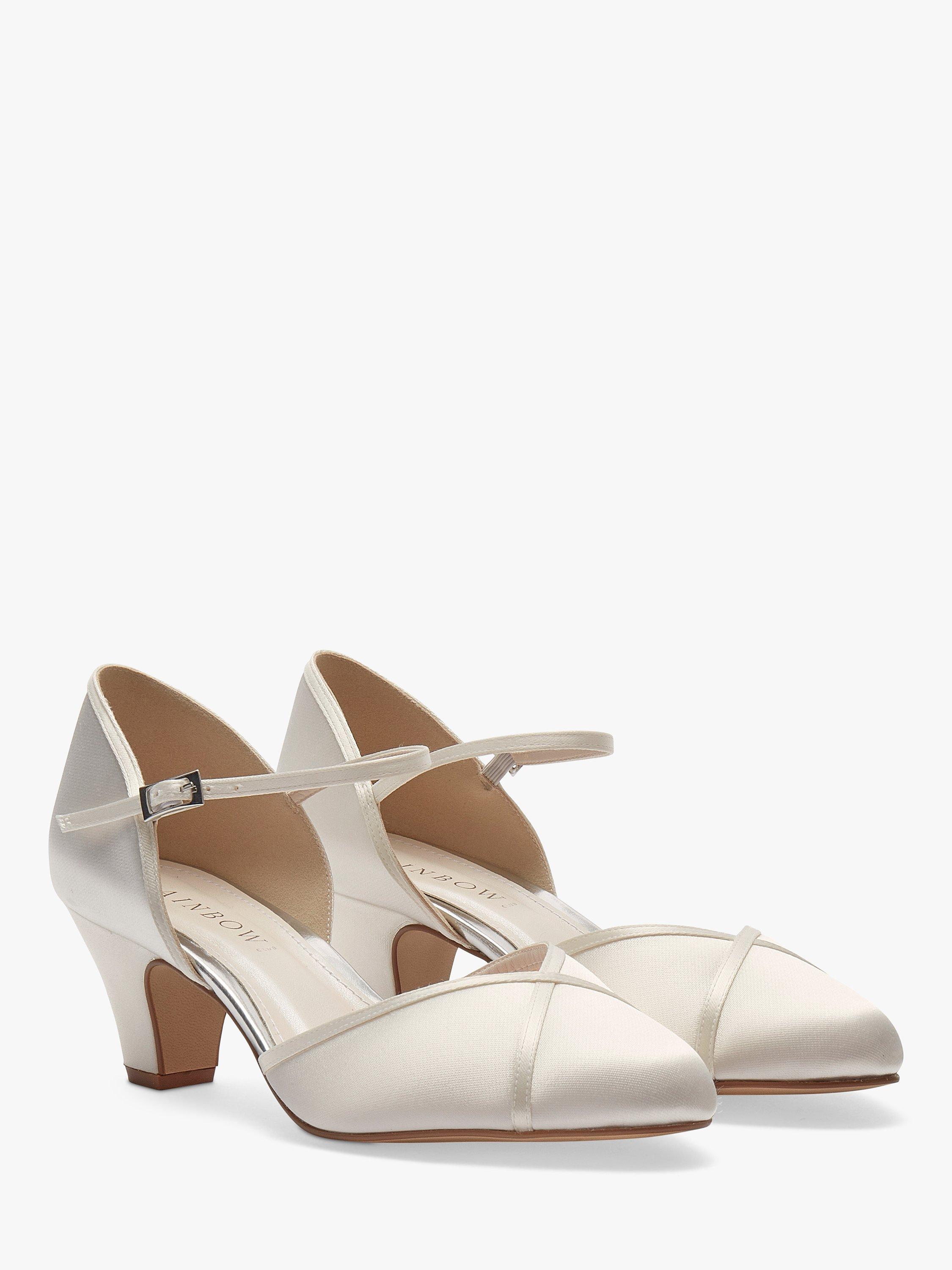Product image 2 of 5, which shows Rainbow Club Shirley Wide Fit Court Shoes, Ivory Satin, 4
