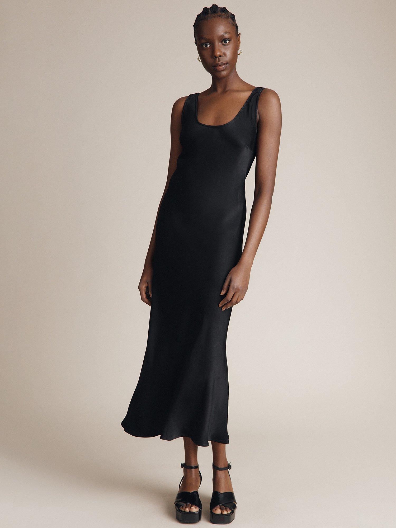 Product image 1 of 4, which shows Ghost Palm Satin Slip Midi Dress, Black, XS