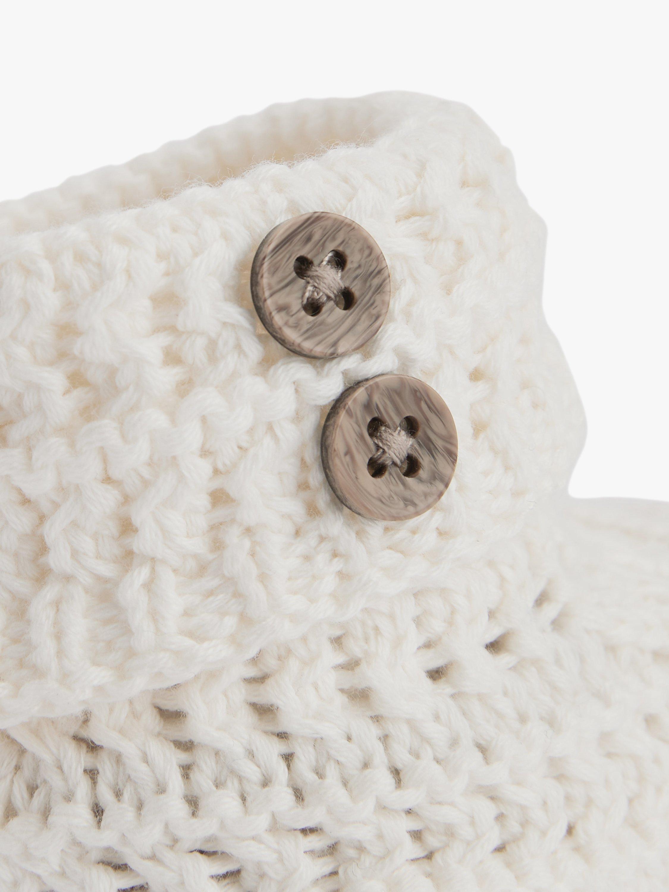 Product image 3 of 5, which shows The Little Tailor Baby Button Knit Booties, Cream, 0-6 months