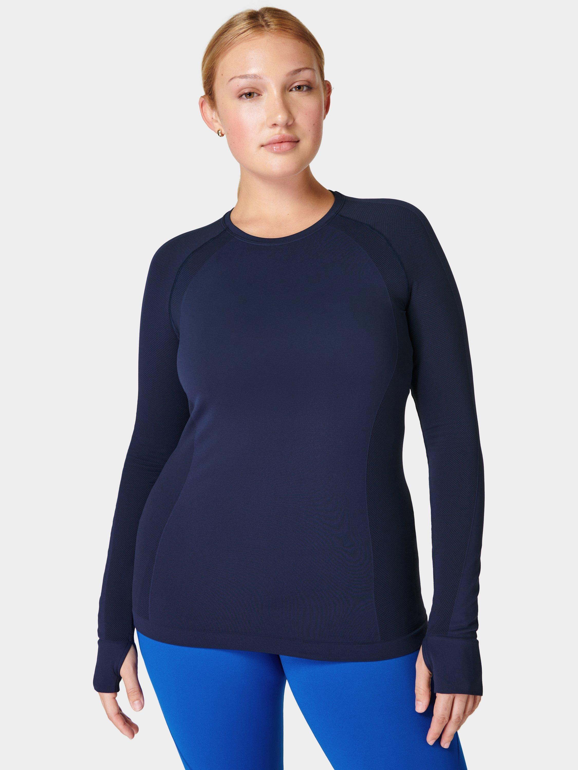 Product image 1 of 7, which shows Sweaty Betty Athlete Seamless Long Sleeve Gym Top, Navy Blue, XS