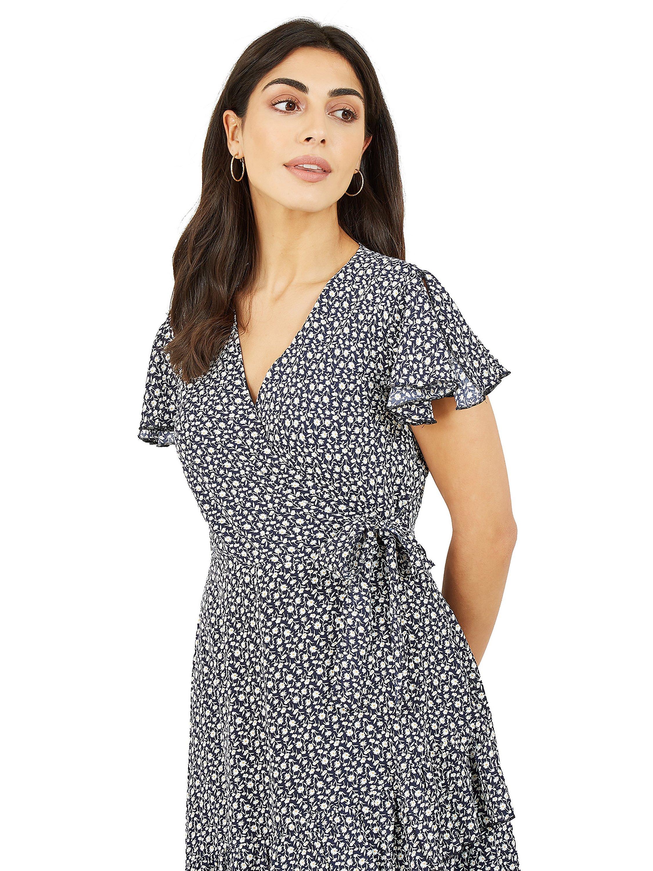 Product image 4 of 5, which shows Yumi Mela London Ditsy Daisy Wrap Effect Frill Mini Dress, Navy, 10