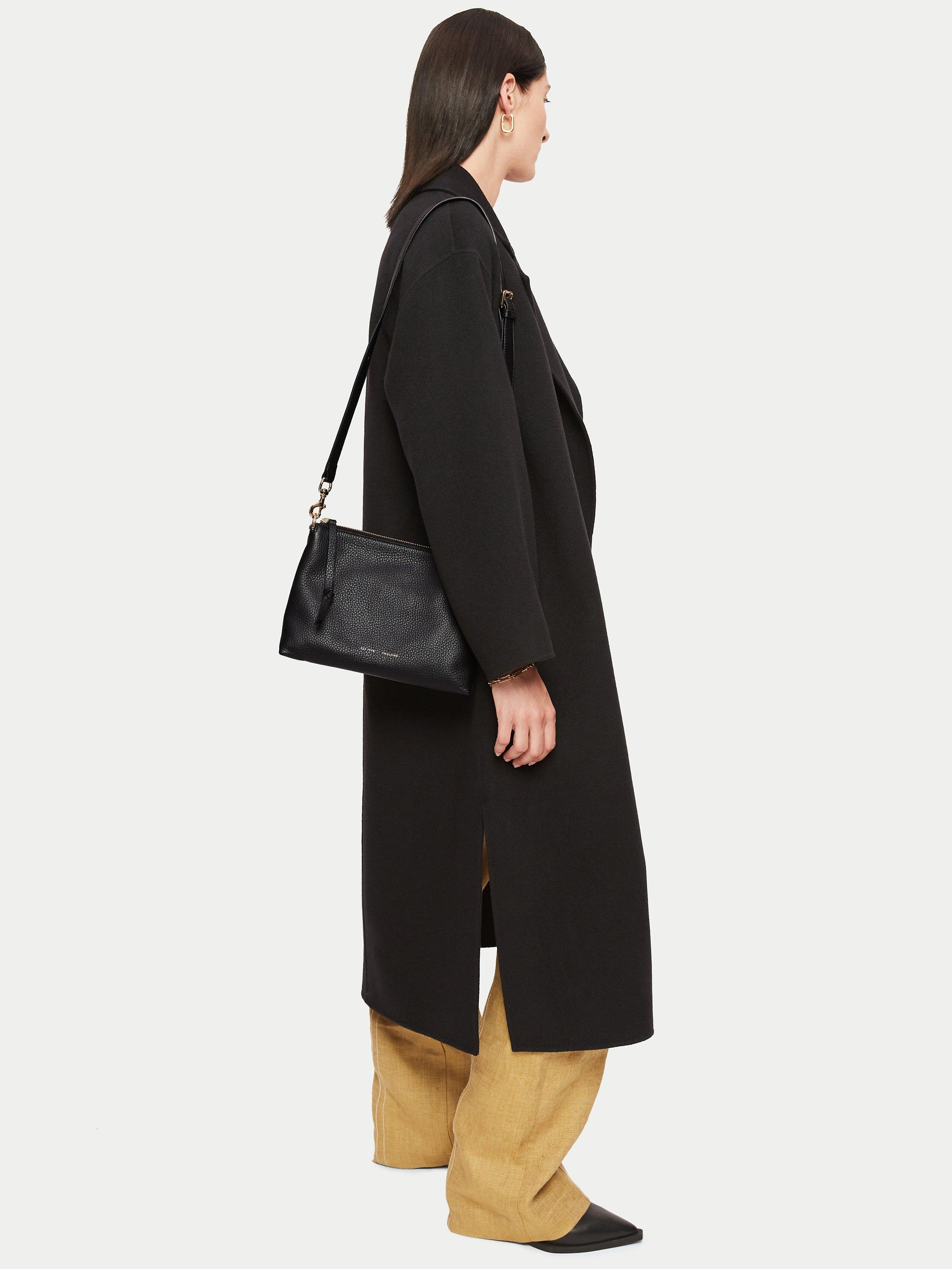 Product image 4 of 5, which shows Jigsaw Ava Pebble Cross Body Bag, Black, One Size
