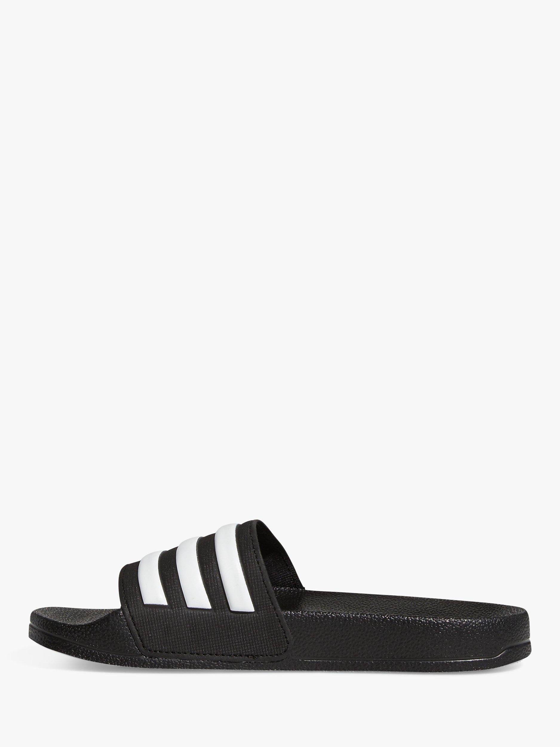 Product image 4 of 10, which shows adidas Kids' Adilette Sliders, Black/White, 5
