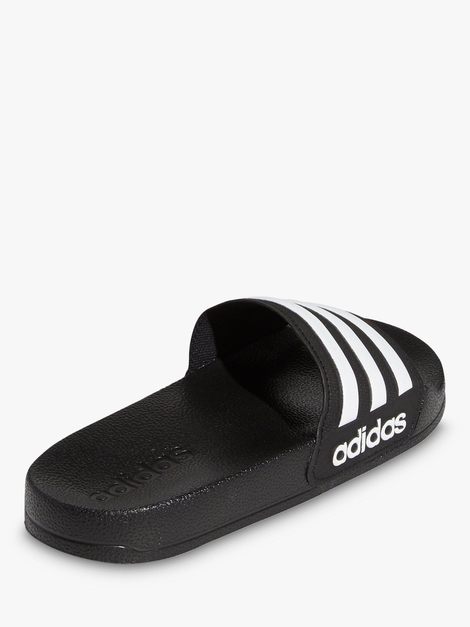 Product image 6 of 10, which shows adidas Kids' Adilette Sliders, Black/White, 5