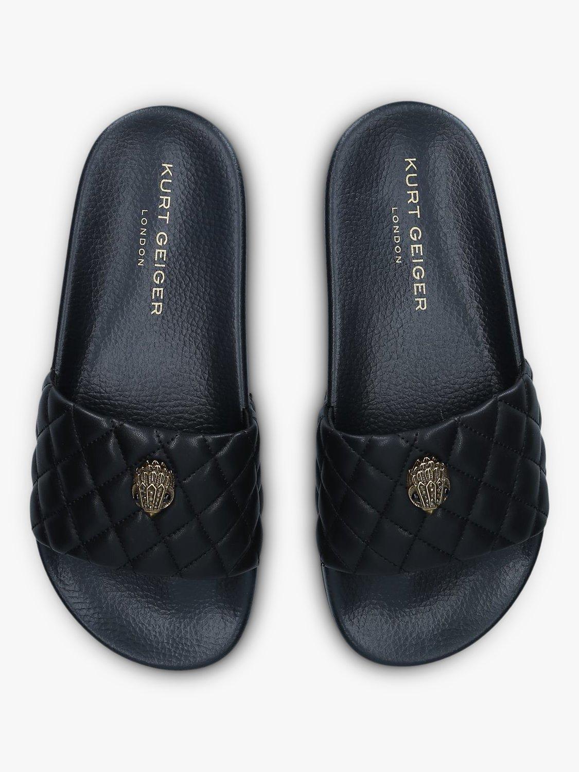 Product image 1 of 6, which shows Kurt Geiger London Meena Eagle Quilted Slider Sandals, Black, 3