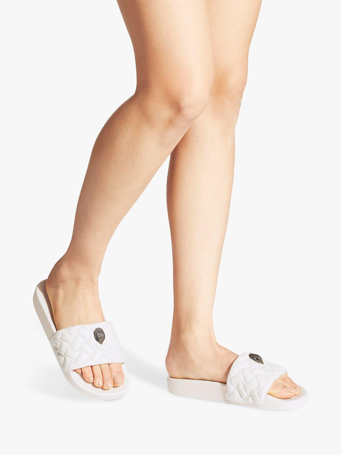 Product image 3 of 6, which shows Kurt Geiger London Meena Eagle Quilted Slider Sandals, Natural Putty, 3