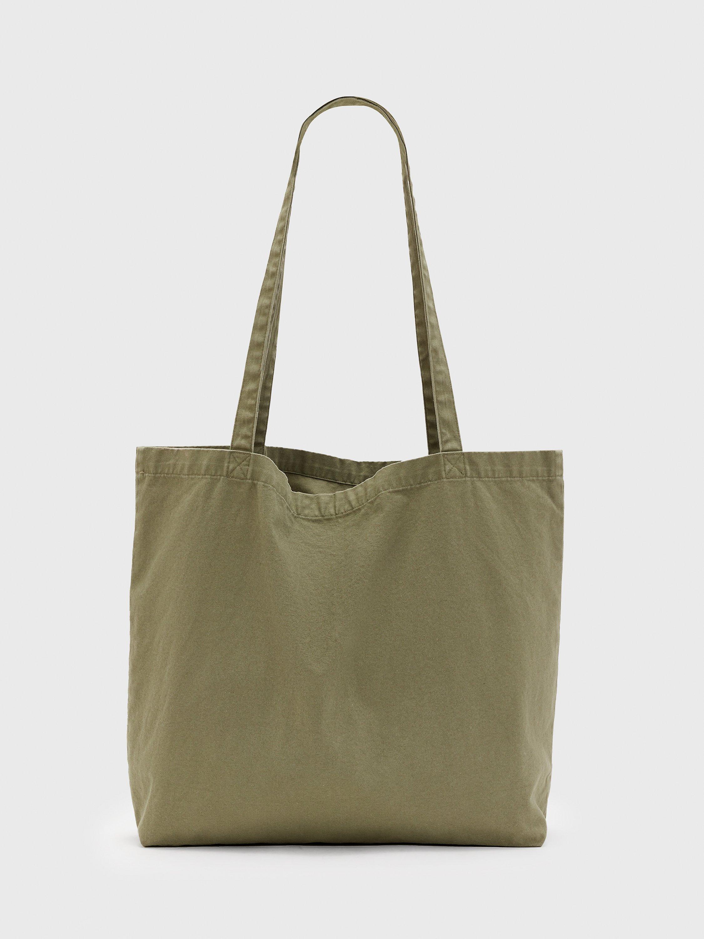 Product image 5 of 6, which shows AllSaints Underground Tote Bag, Nori Green/Black, One Size
