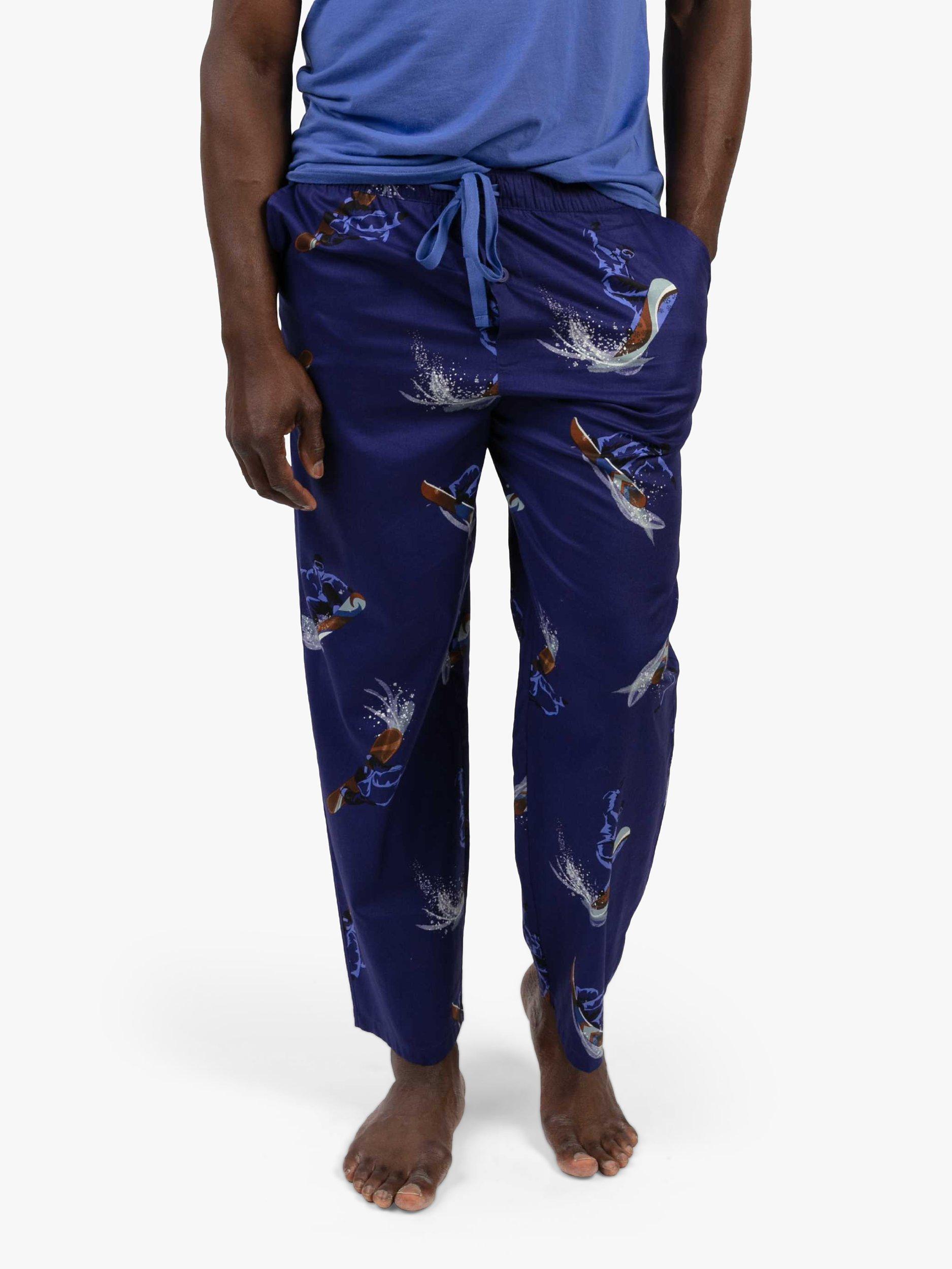 Product image 1 of 4, which shows Cyberjammies Jamie Snowboarder Print Lounge Pants, Navy Blue, S