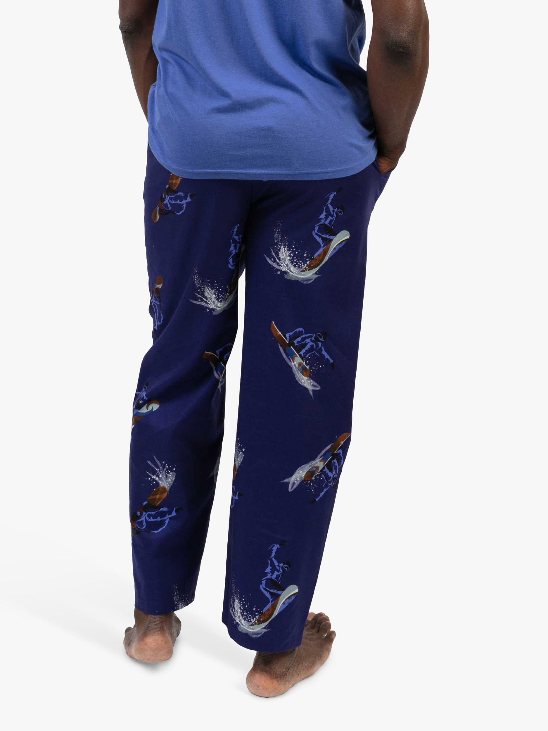 Product image 2 of 4, which shows Cyberjammies Jamie Snowboarder Print Lounge Pants, Navy Blue, S