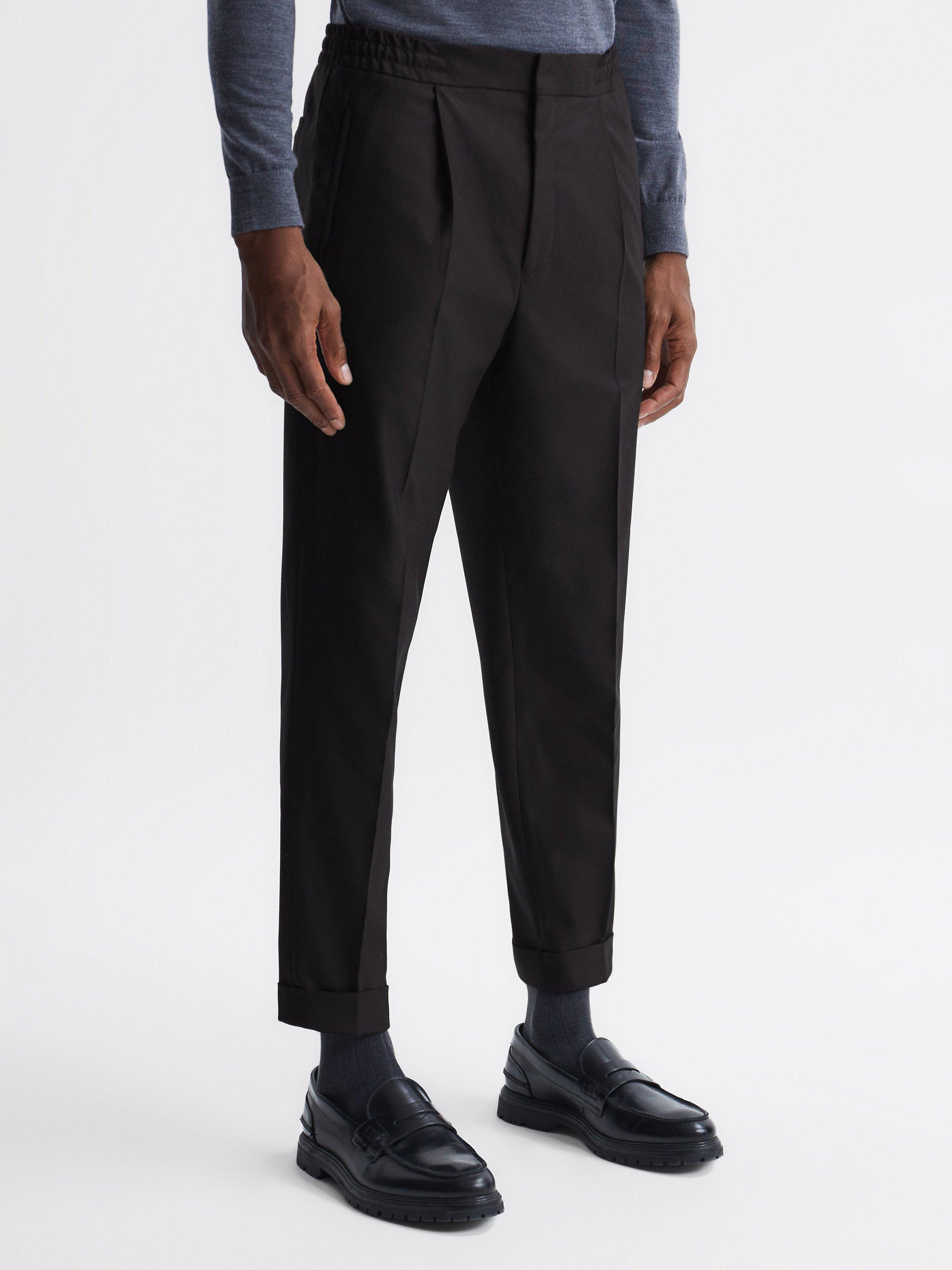 Product image 1 of 5, which shows Reiss Brighton Pleated Slim Trousers, Black, 36R