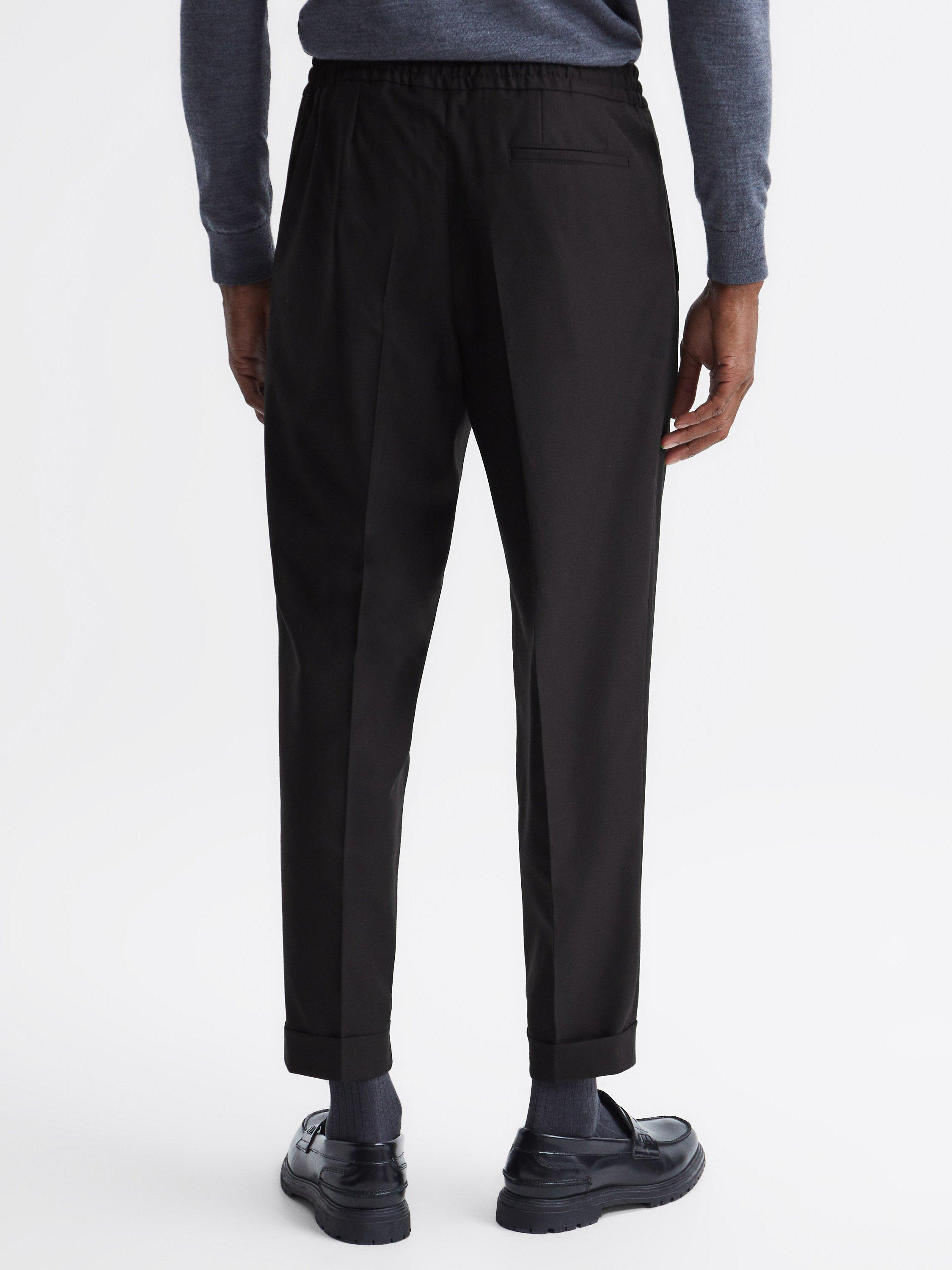 Product image 2 of 5, which shows Reiss Brighton Pleated Slim Trousers, Black, 36R