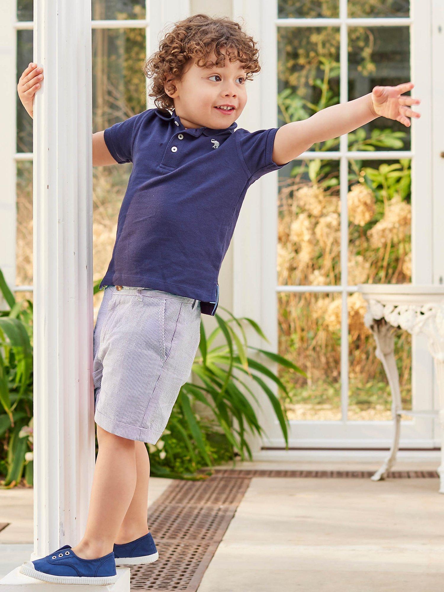 Product image 4 of 5, which shows Trotters Kids' Harry Pique Polo Shirt, Navy, 10-11 years