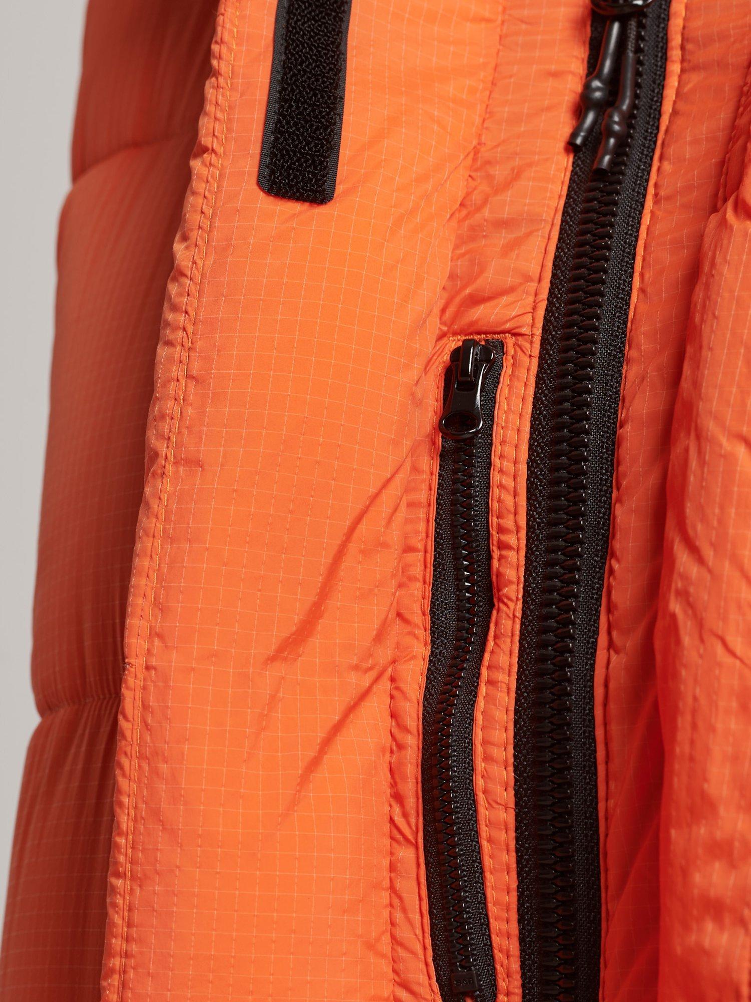 Product image 4 of 6, which shows Superdry Ripstop Longline Puffer Gilet, Orange Grid, 8