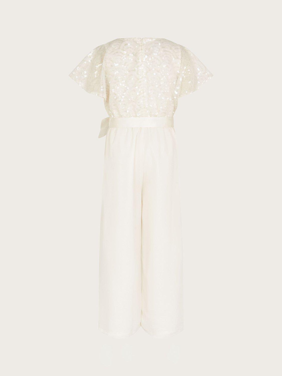 Product image 2 of 5, which shows Monsoon Kids' Truth Deco Cape Sleeve Jumpsuit, Ivory, 3-4 years