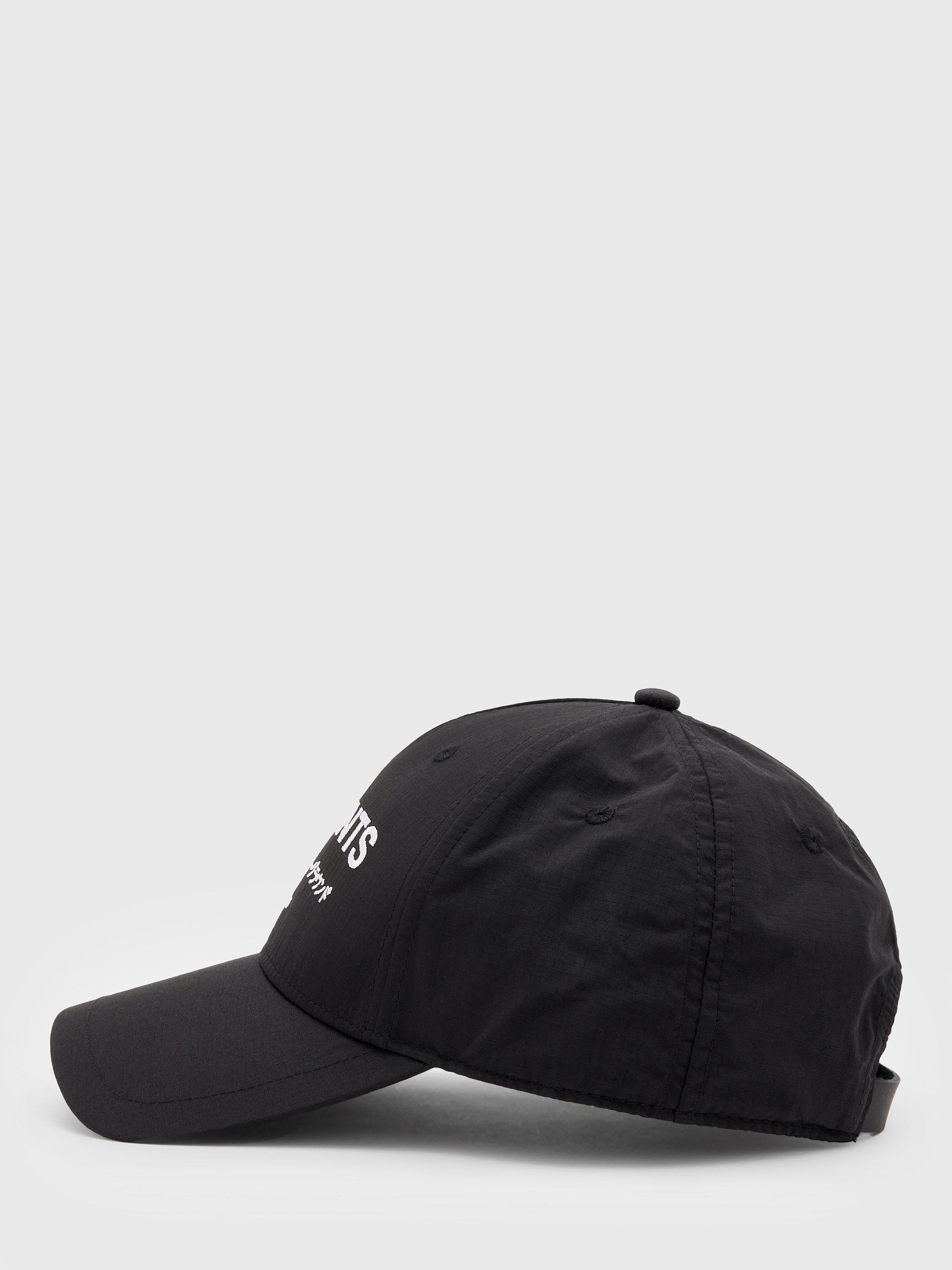 Product image 4 of 5, which shows AllSaints Underground Baseball Cap, One Size, Black/Matte Black
