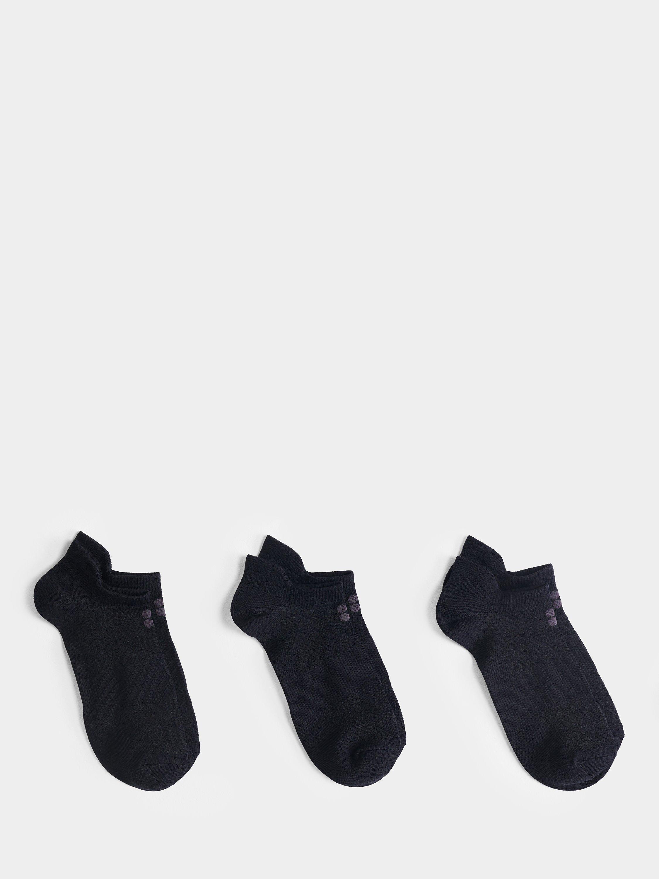 Product image 1 of 2, which shows Sweaty Betty Plain Lightweight Trainer Socks, Pack of 3, Black/Grey, 2.5-5