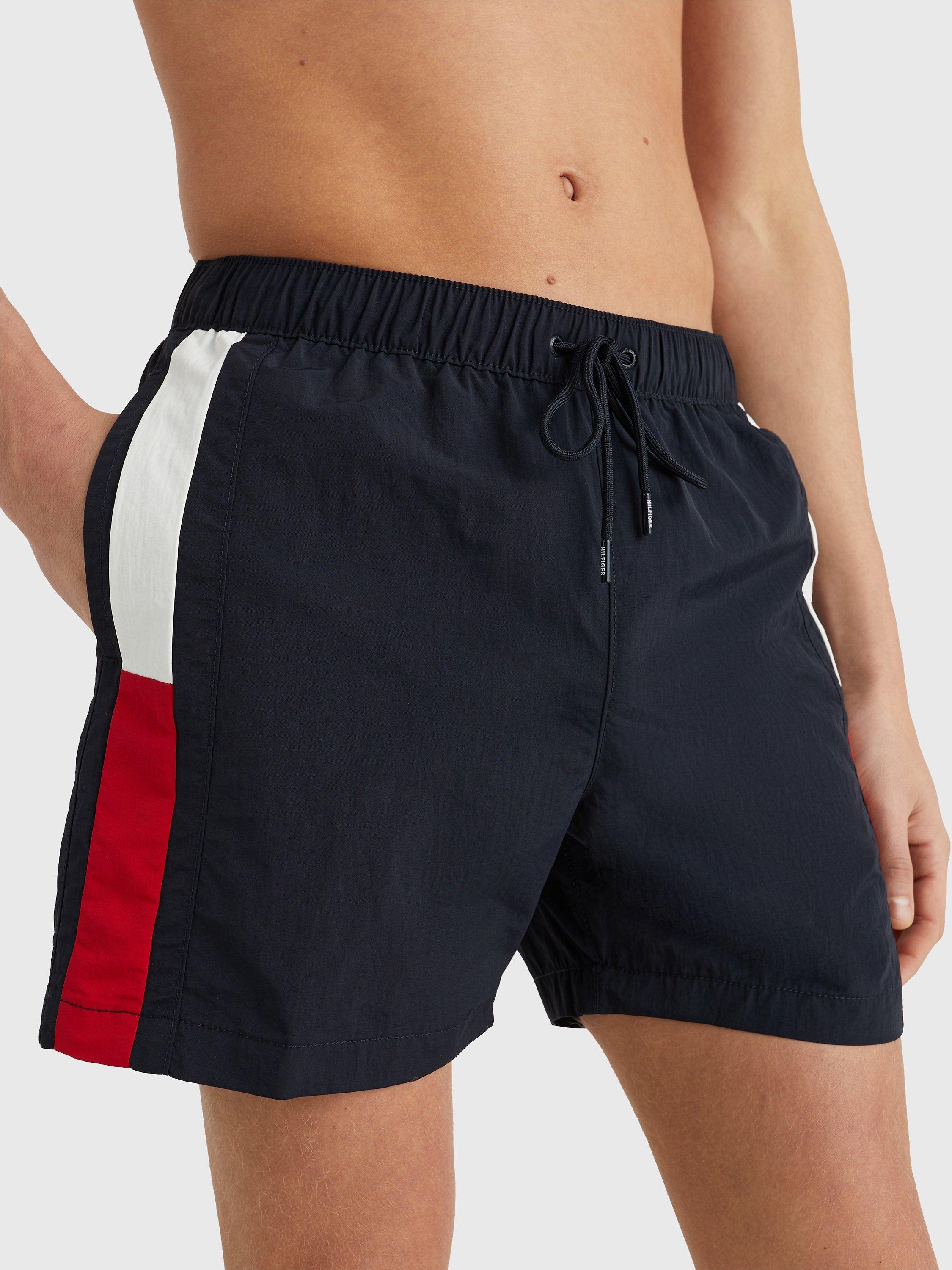 Product image 1 of 4, which shows Tommy Hilfiger Recycled Nylon Flag Swim Shorts, Desert Sky, S