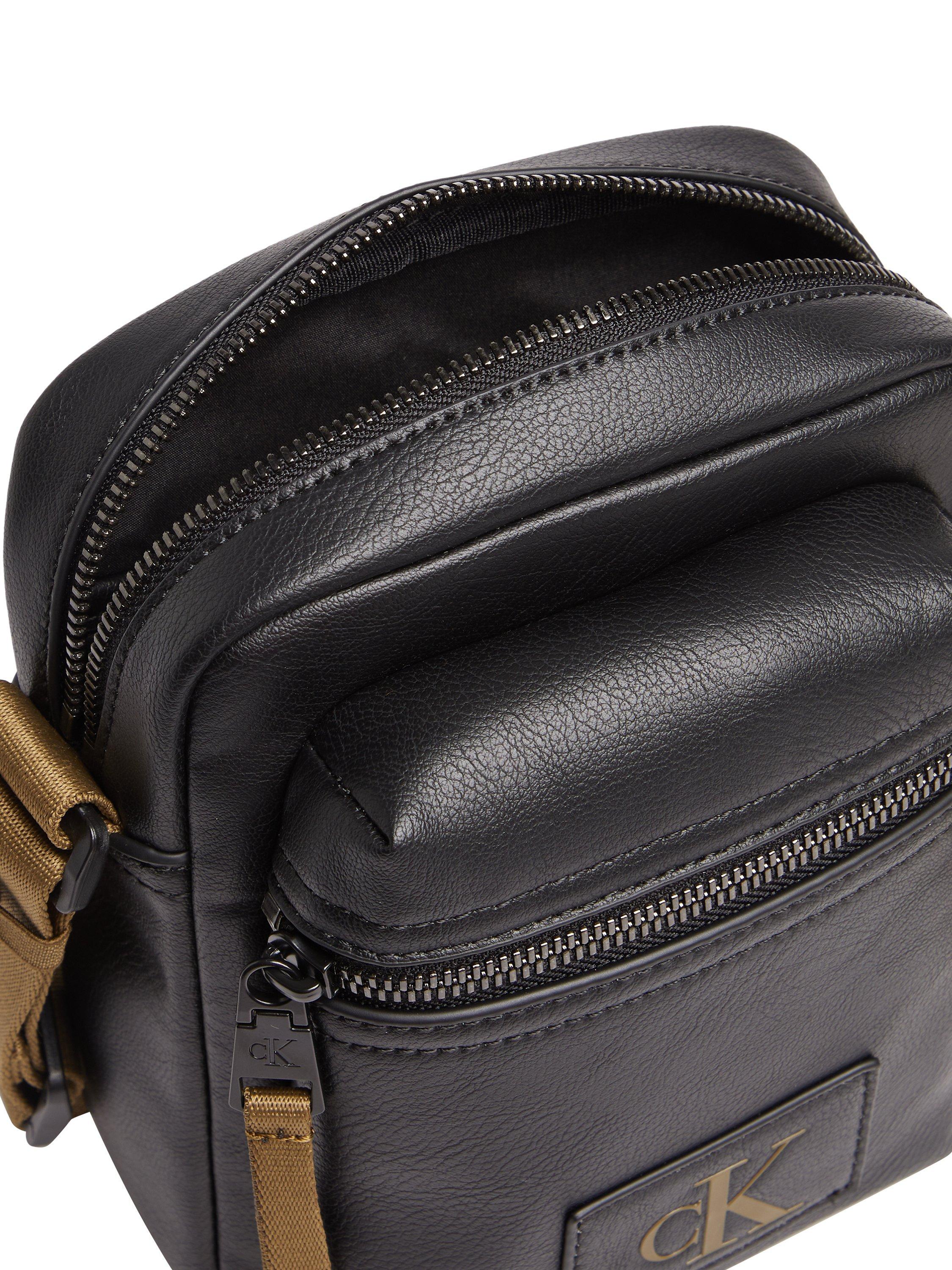 Product image 3 of 3, which shows Calvin Klein Tagged Reporter Bag, Black