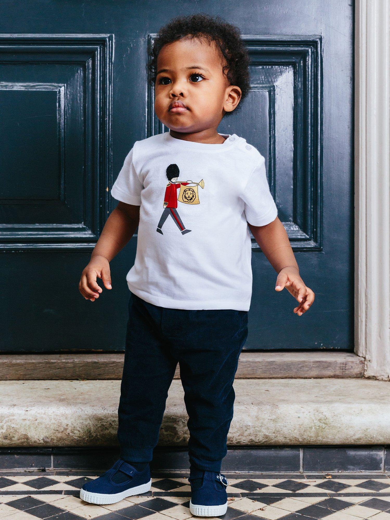 Product image 3 of 5, which shows Trotters Baby Guardsman T-Shirt, White, 3-6 months