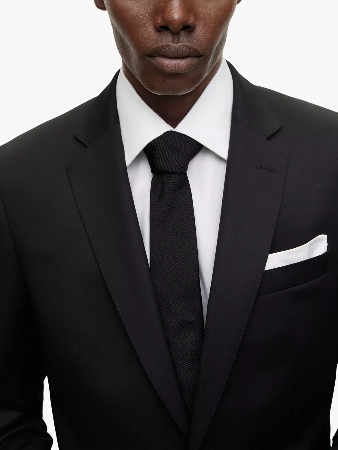 Man with a pocket square in his blazer pocket