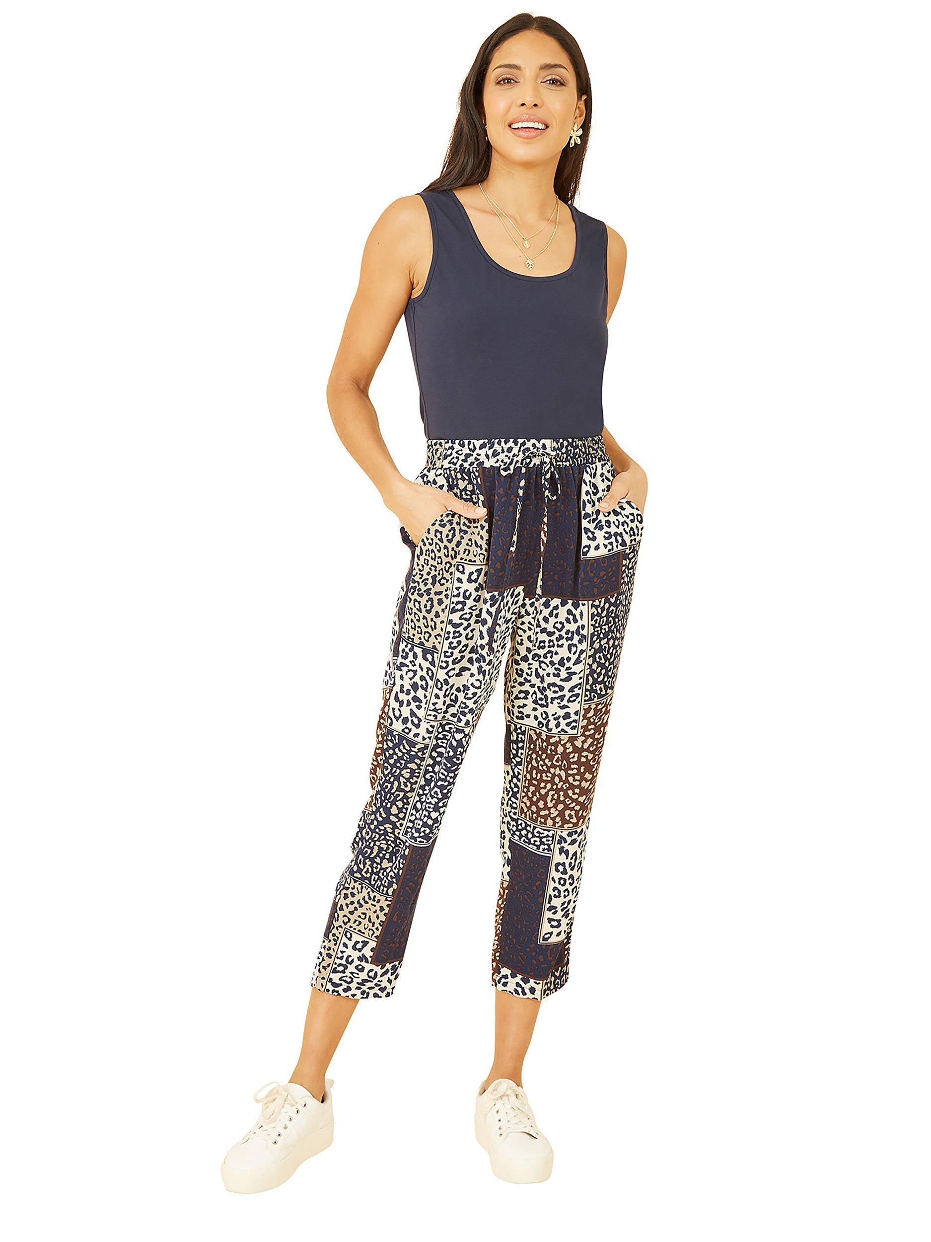 Product image 3 of 4, which shows Yumi Patchwork Animal Print Cropped Trousers, Navy/Multi, 8