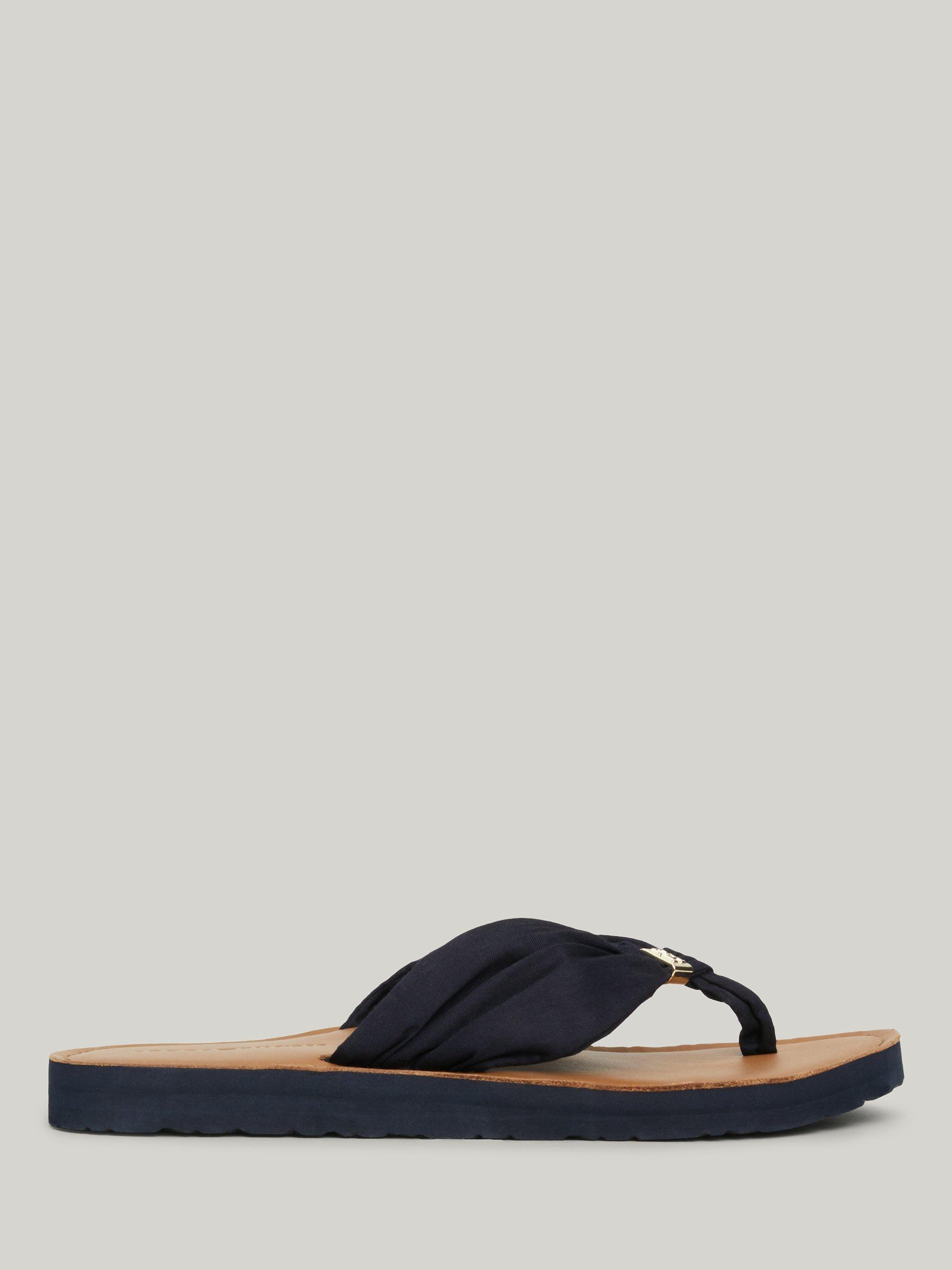 Product image 2 of 7, which shows Tommy Hilfiger Beach Flip Flop Sandals, Space Blue, 6