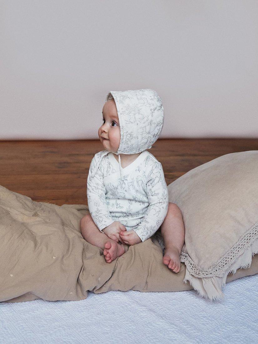 Product image 1 of 7, which shows The Little Tailor Baby Super Soft Woven Bonnet, White Woodland, 6 months