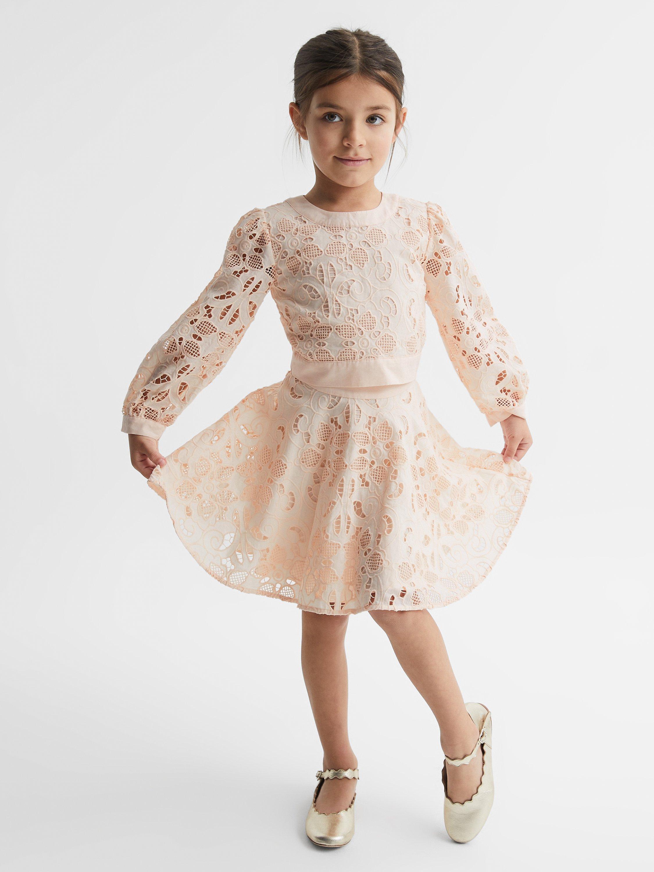 Product image 1 of 5, which shows Reiss Kids' Nella Cotton Lace Mini Skirt, Pink, 10-11 years